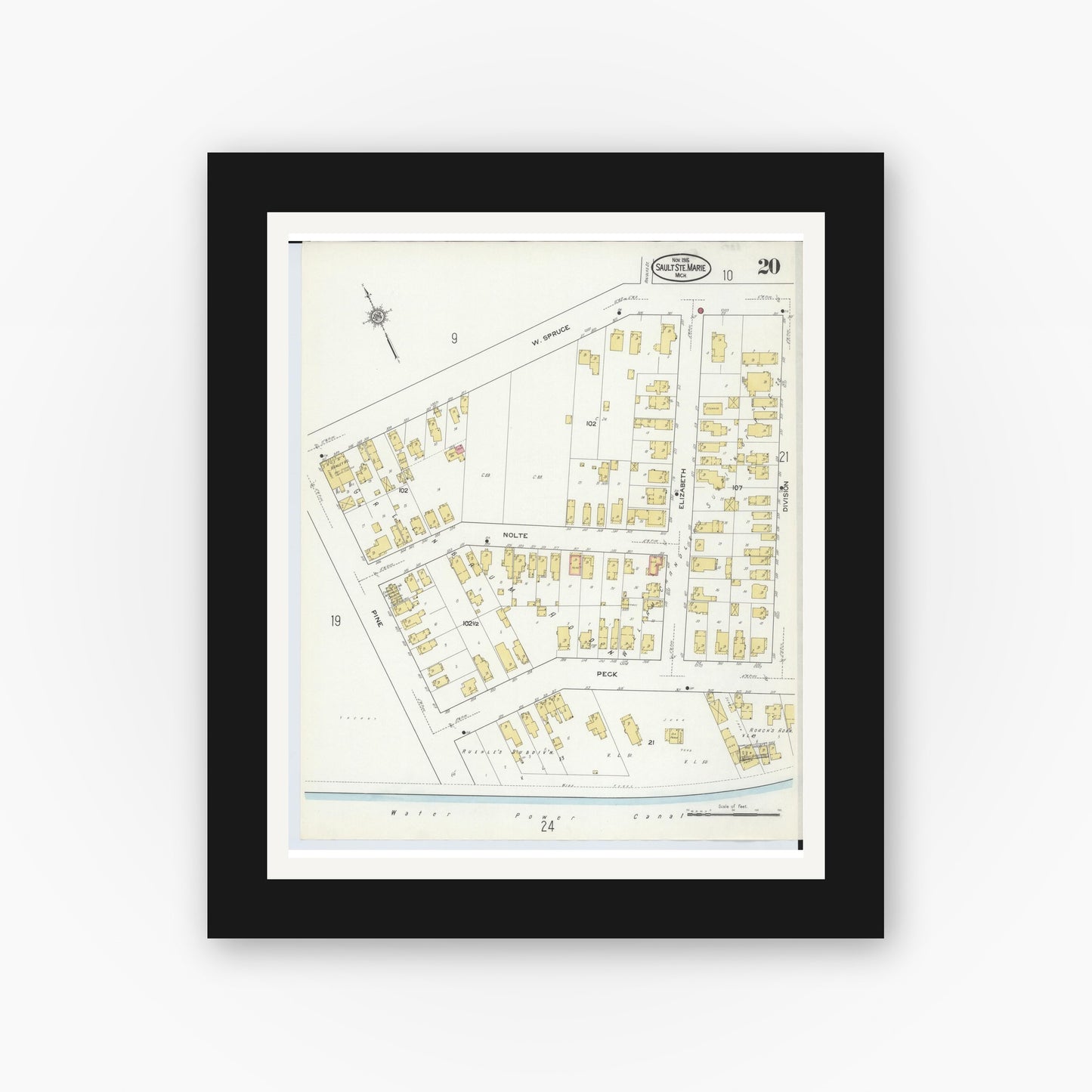 Old map wall art mockup — black gallery frame with white mat — Sanborn Fire Insurance Map from Sault Sainte Marie, Chippewa County, Michigan (1915), Sheet #0020
