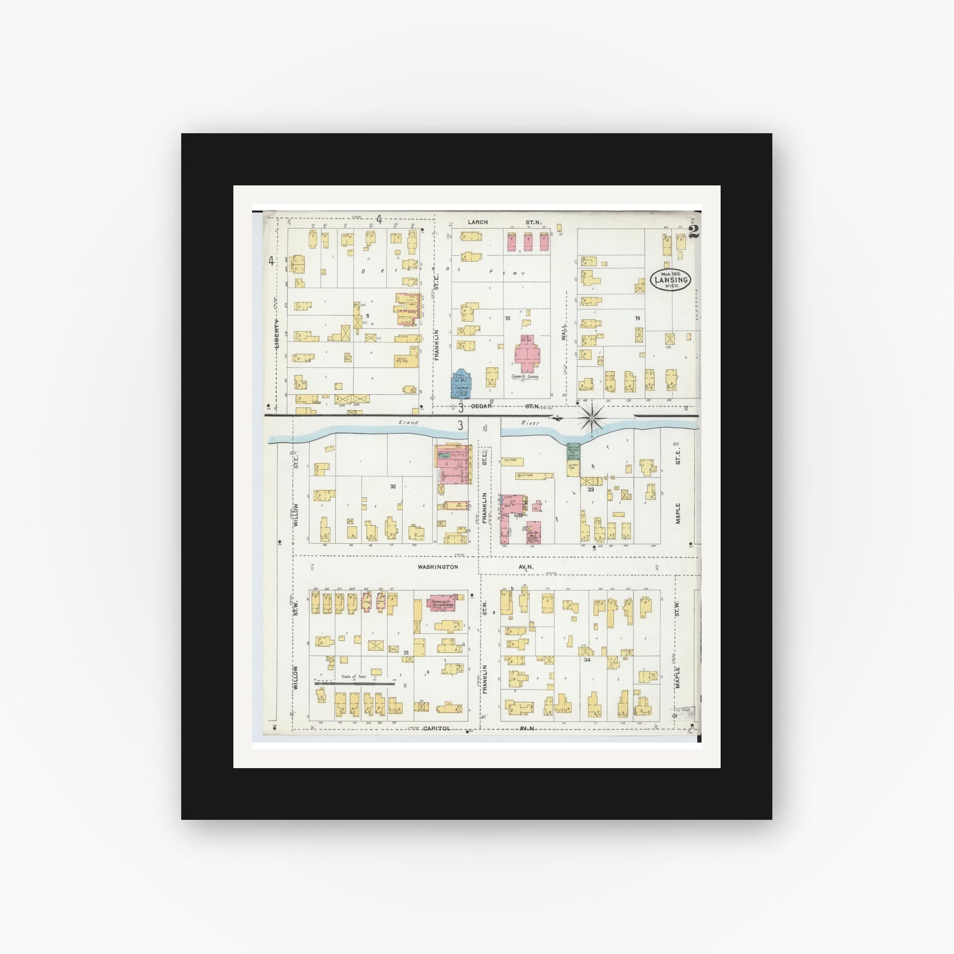 Old map wall art mockup — black gallery frame with white mat — Sanborn Fire Insurance Map from Lansing, Ingham County, Michigan (1906), Sheet #0002