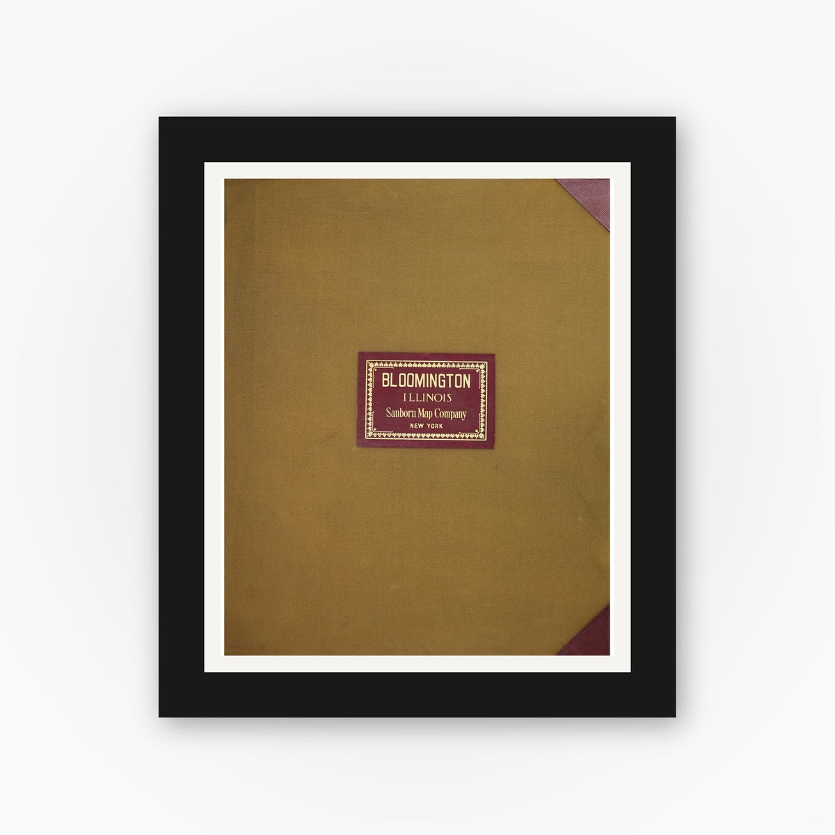 Old map wall art mockup — black gallery frame with white mat — Sanborn Fire Insurance Map from Bloomington, McLean County, Illinois (1950), Sheet #0001