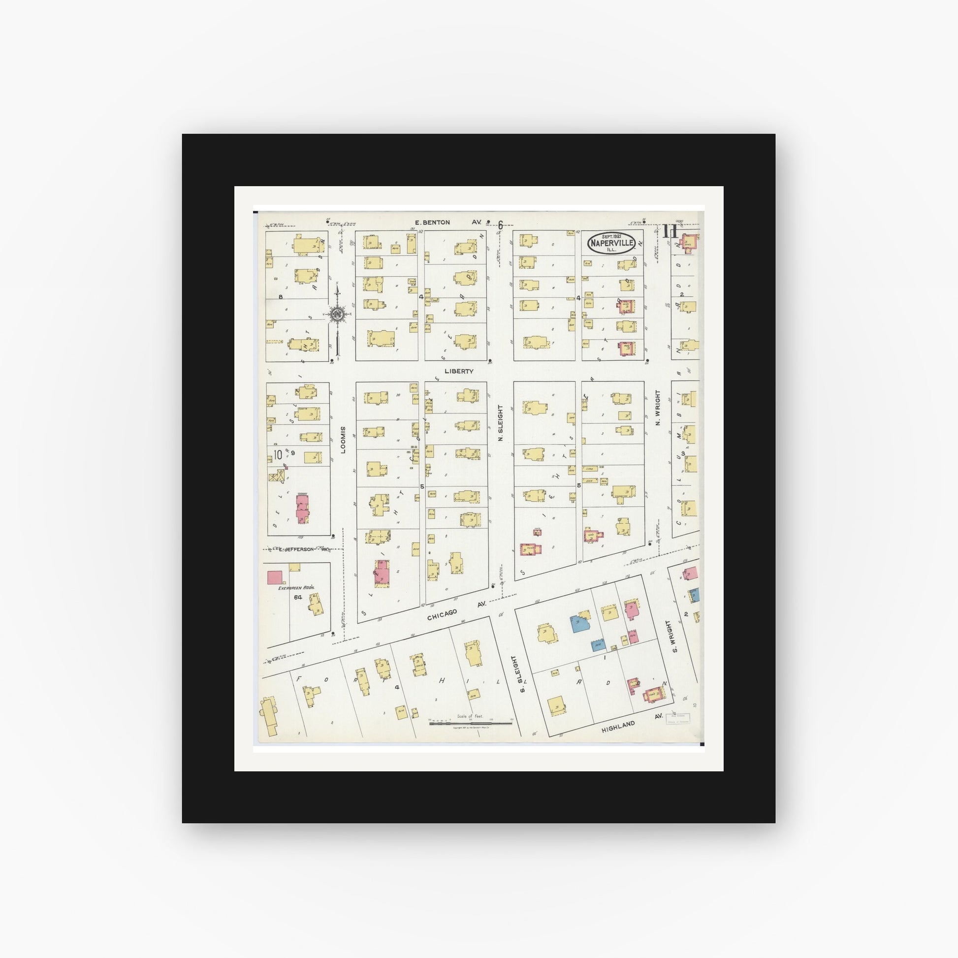 Old map wall art mockup — black gallery frame with white mat — Sanborn Fire Insurance Map from Naperville, Du Page County, Illinois (1921), Sheet #0011