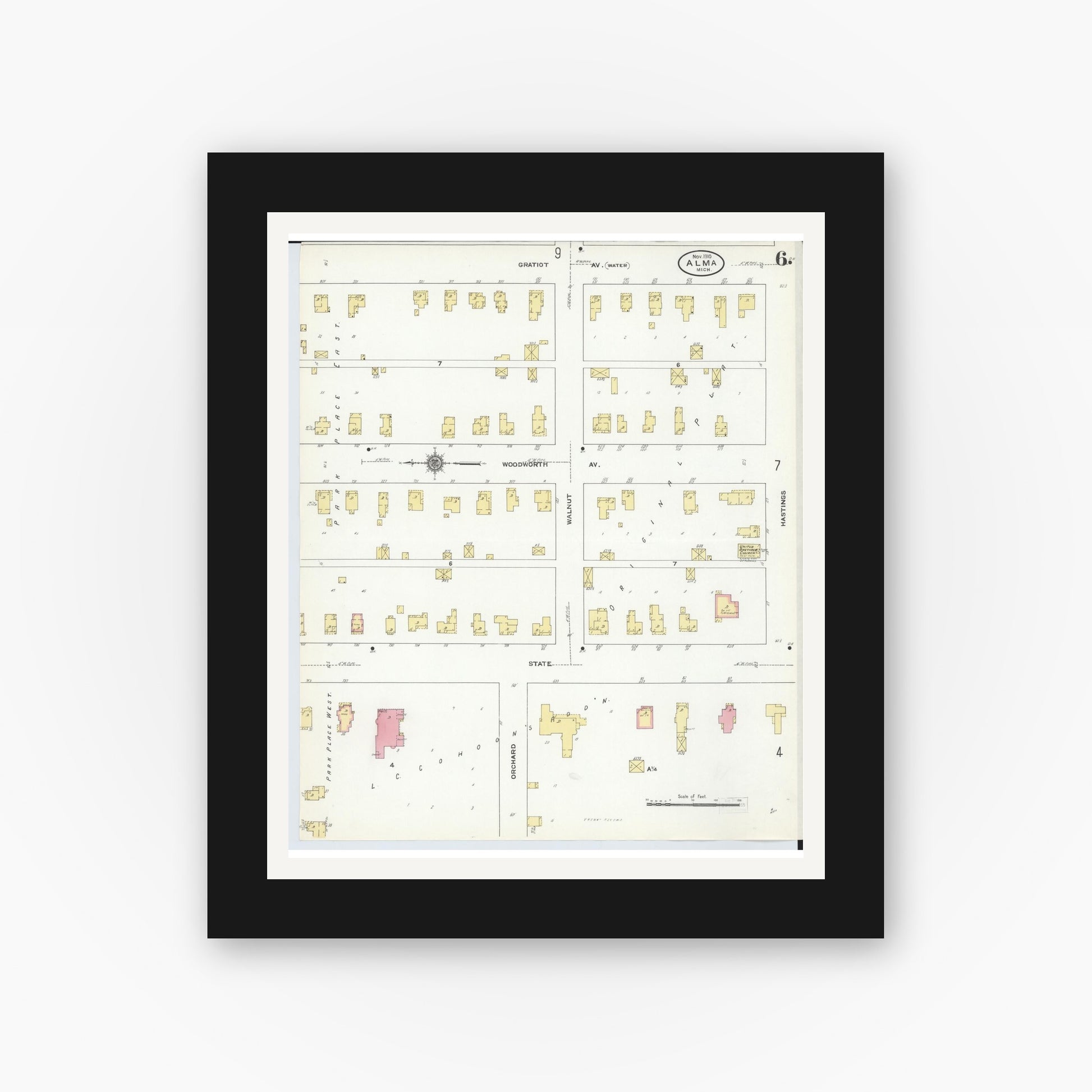 Old map wall art mockup — black gallery frame with white mat — Sanborn Fire Insurance Map from Alma, Gratiot County, Michigan (1910), Sheet #0006