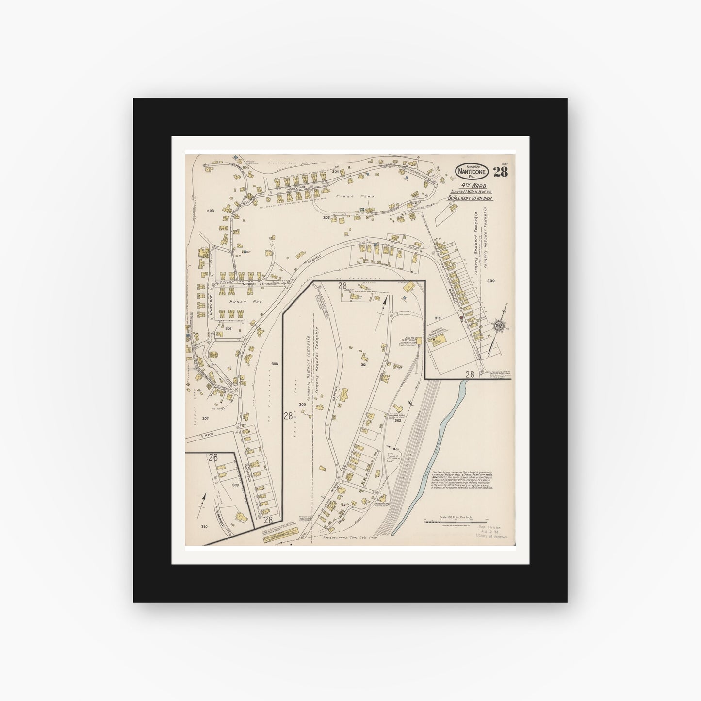 Old map wall art mockup — black gallery frame with white mat — Sanborn Fire Insurance Map from Nanticoke, Luzerne County, Pennsylvania (1920), Sheet #0028