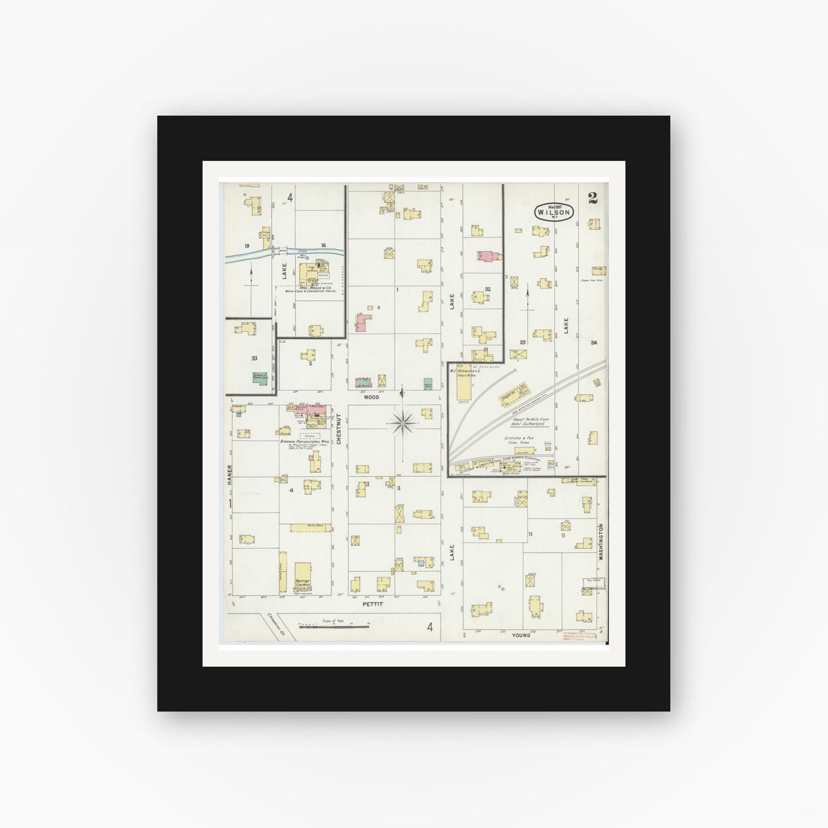 Old map wall art mockup — black gallery frame with white mat — Sanborn Fire Insurance Map from Wilson, Niagara County, New York (1897), Sheet #0002