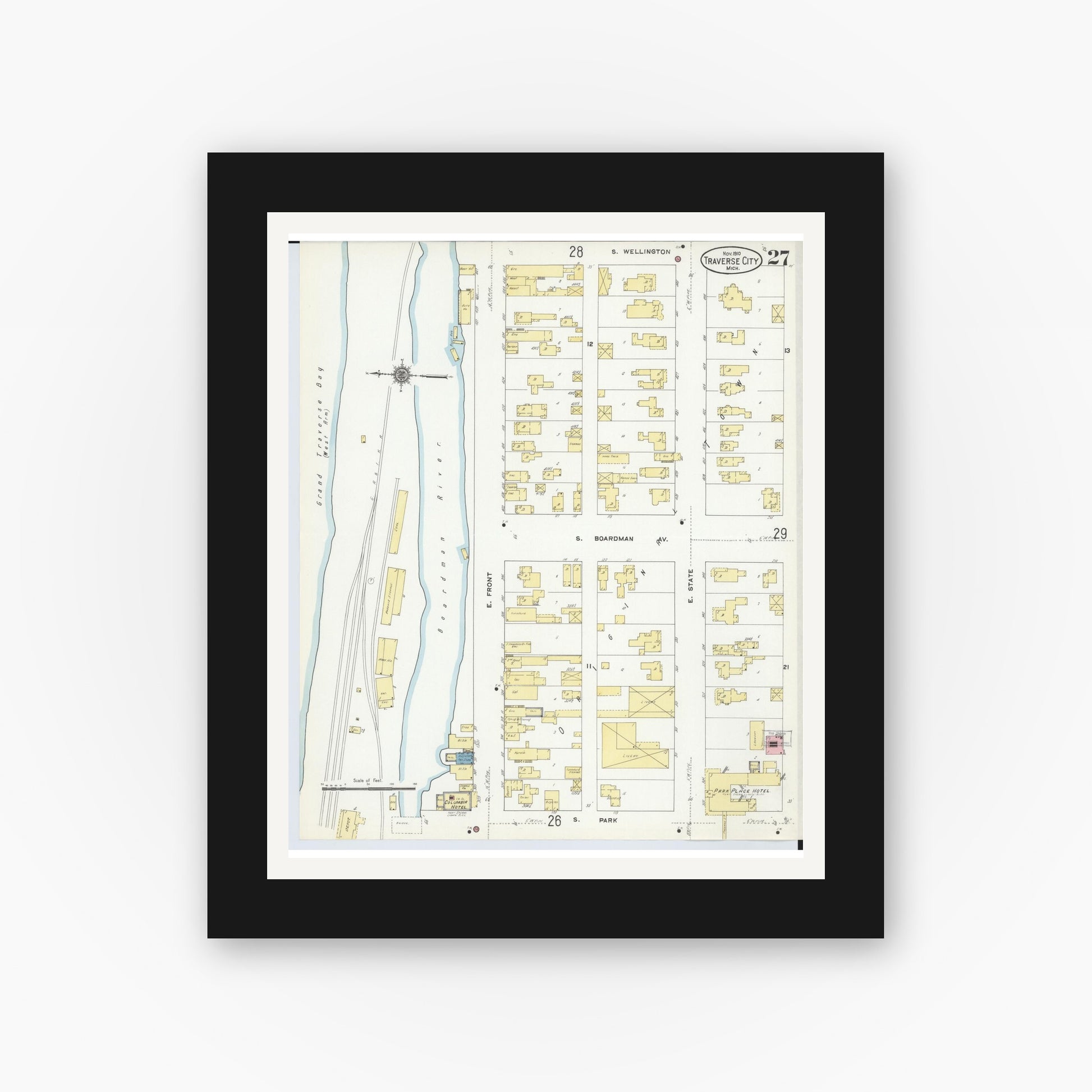 Old map wall art mockup — black gallery frame with white mat — Sanborn Fire Insurance Map from Traverse City, Grand Traverse County, Michigan (1910), Sheet #0027