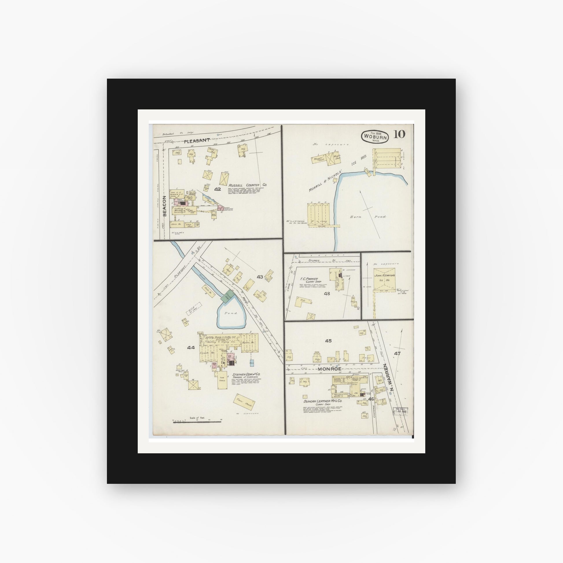 Old map wall art mockup — black gallery frame with white mat — Sanborn Fire Insurance Map from Woburn, Middlesex County, Massachusetts (1888), Sheet #0010