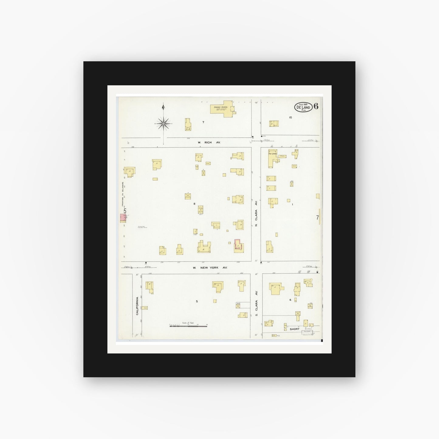 Old map wall art mockup — black gallery frame with white mat — Sanborn Fire Insurance Map from De Land, Volusia County, Florida (1909), Sheet #0006