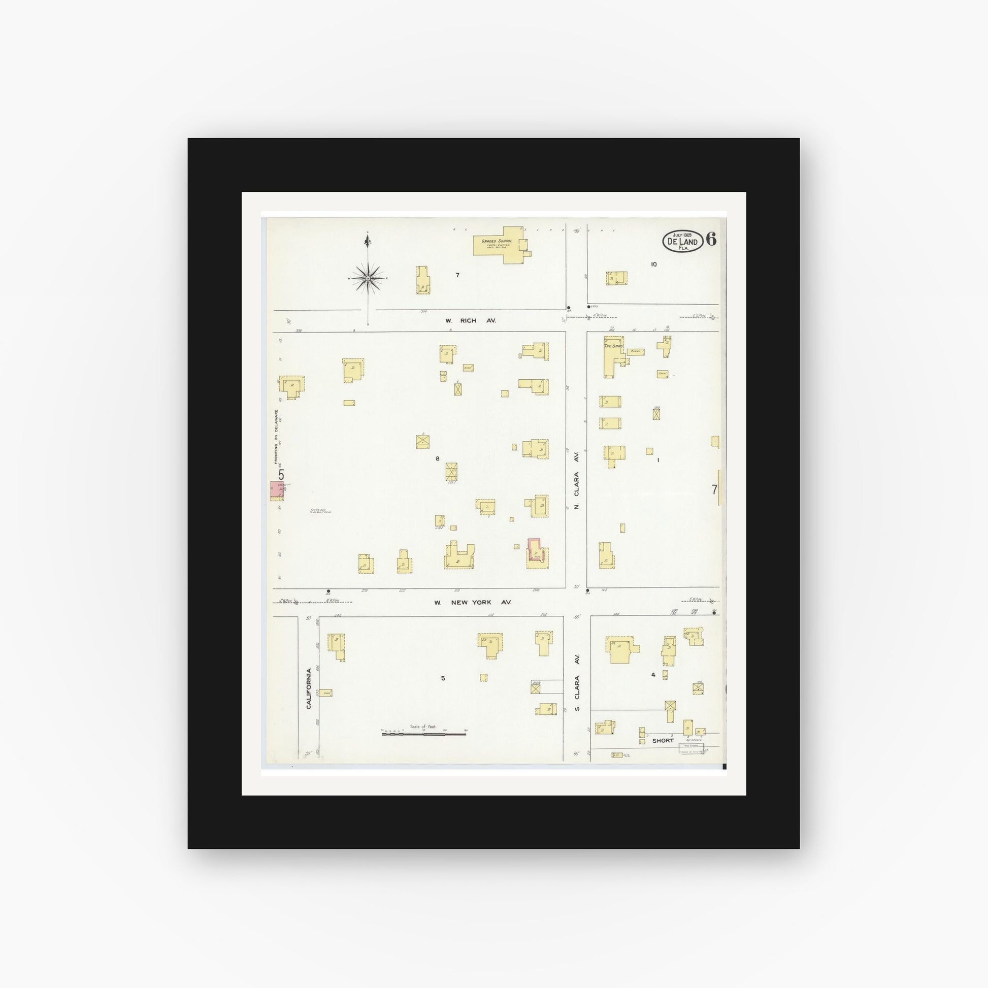 Old map wall art mockup — black gallery frame with white mat — Sanborn Fire Insurance Map from De Land, Volusia County, Florida (1909), Sheet #0006