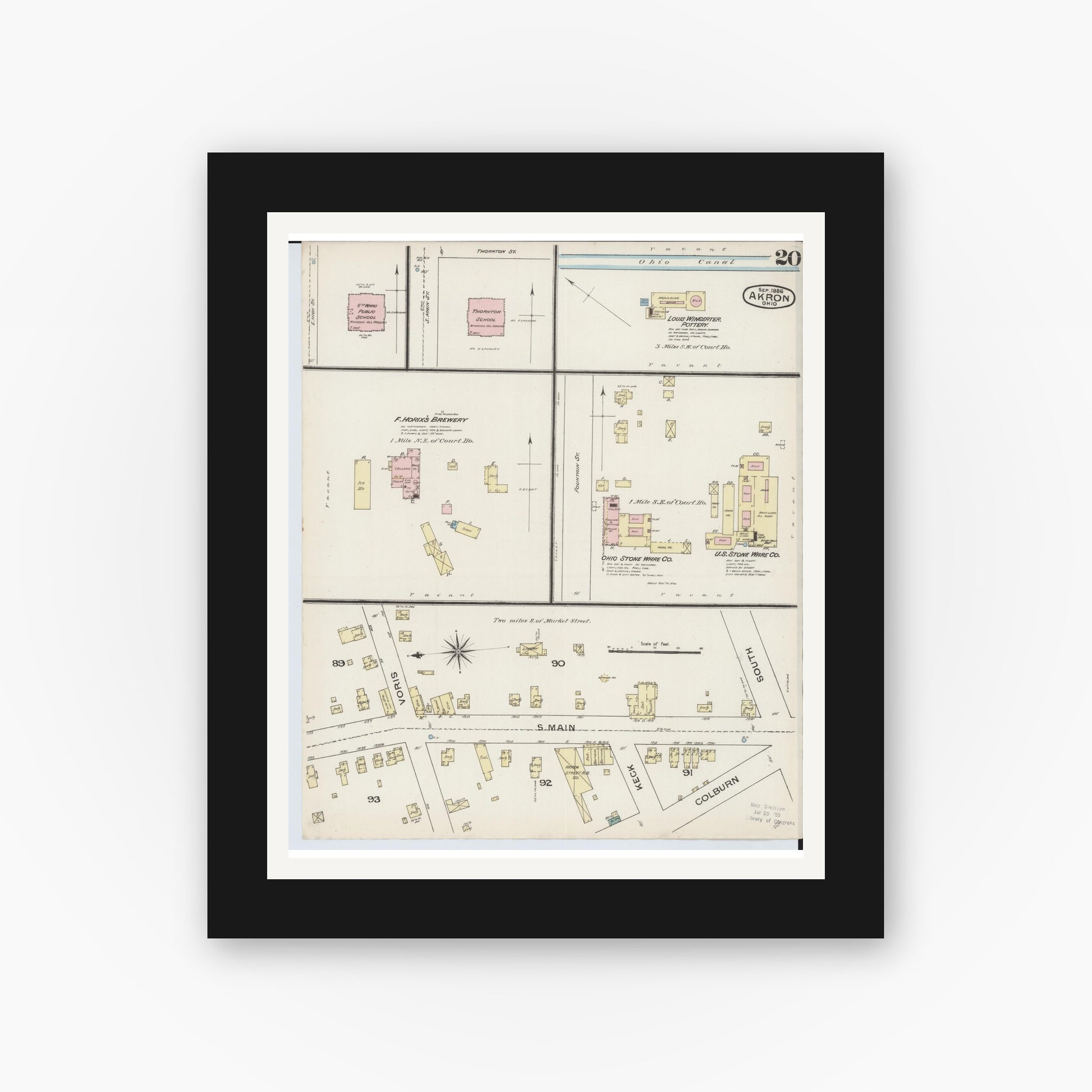 Old map wall art mockup — black gallery frame with white mat — Sanborn Fire Insurance Map from Akron, Summit County, Ohio (1886), Sheet #0020