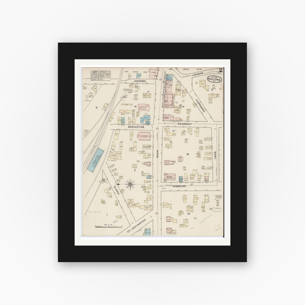 Old map wall art mockup — black gallery frame with white mat — Sanborn Fire Insurance Map from Malone, Franklin County, New York (1884), Sheet #0002