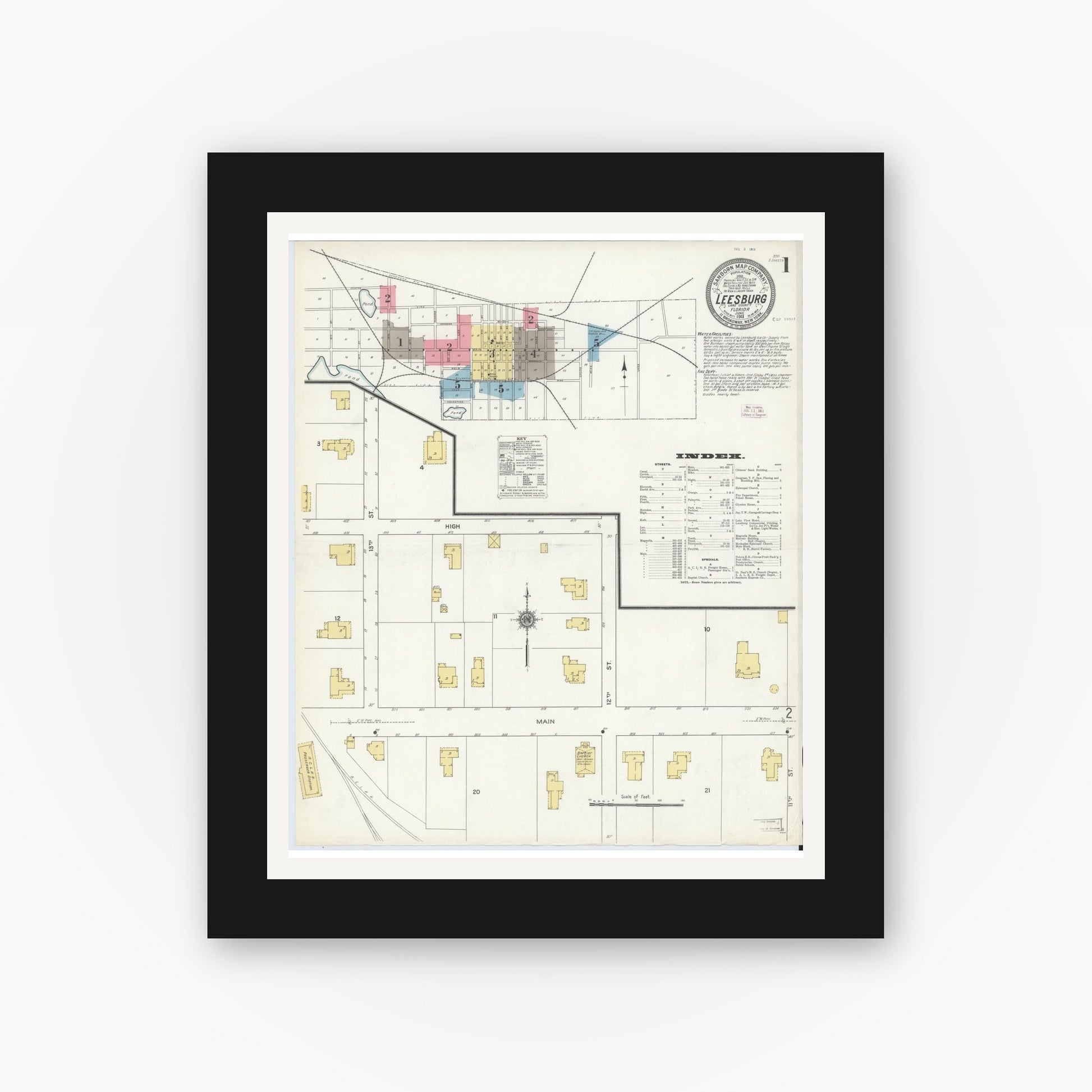 Old map wall art mockup — black gallery frame with white mat — Sanborn Fire Insurance Map from Leesburg, Lake County, Florida (1911) - Complete Map Set