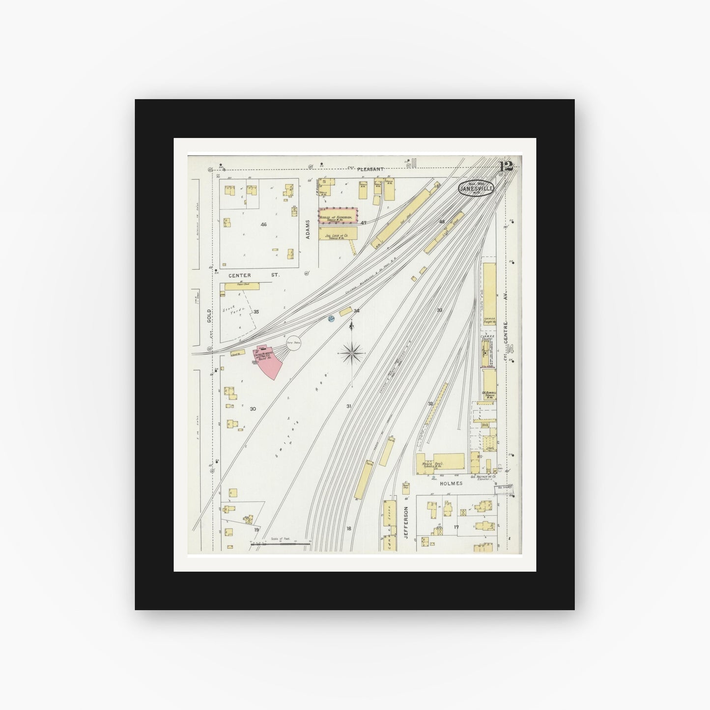 Old map wall art mockup — black gallery frame with white mat — Sanborn Fire Insurance Map from Janesville, Rock County, Wisconsin (1895), Sheet #0012
