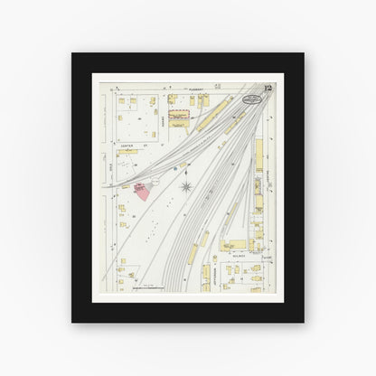 Old map wall art mockup — black gallery frame with white mat — Sanborn Fire Insurance Map from Janesville, Rock County, Wisconsin (1895), Sheet #0012