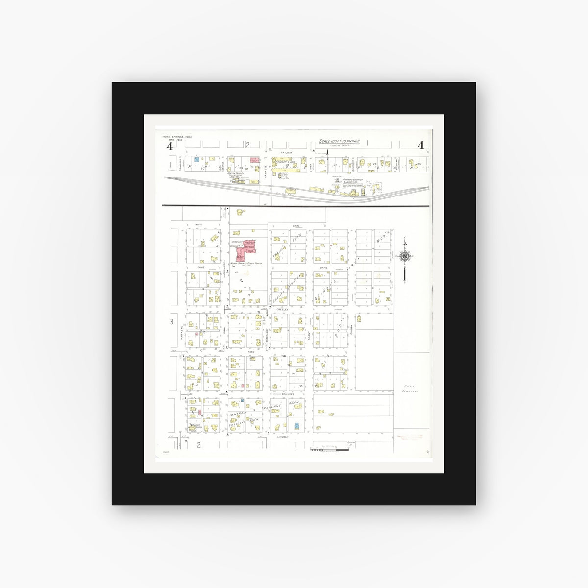 Old map wall art mockup — black gallery frame with white mat — Sanborn Fire Insurance Map from Nora Springs, Floyd County, Iowa (1942), Sheet #0004