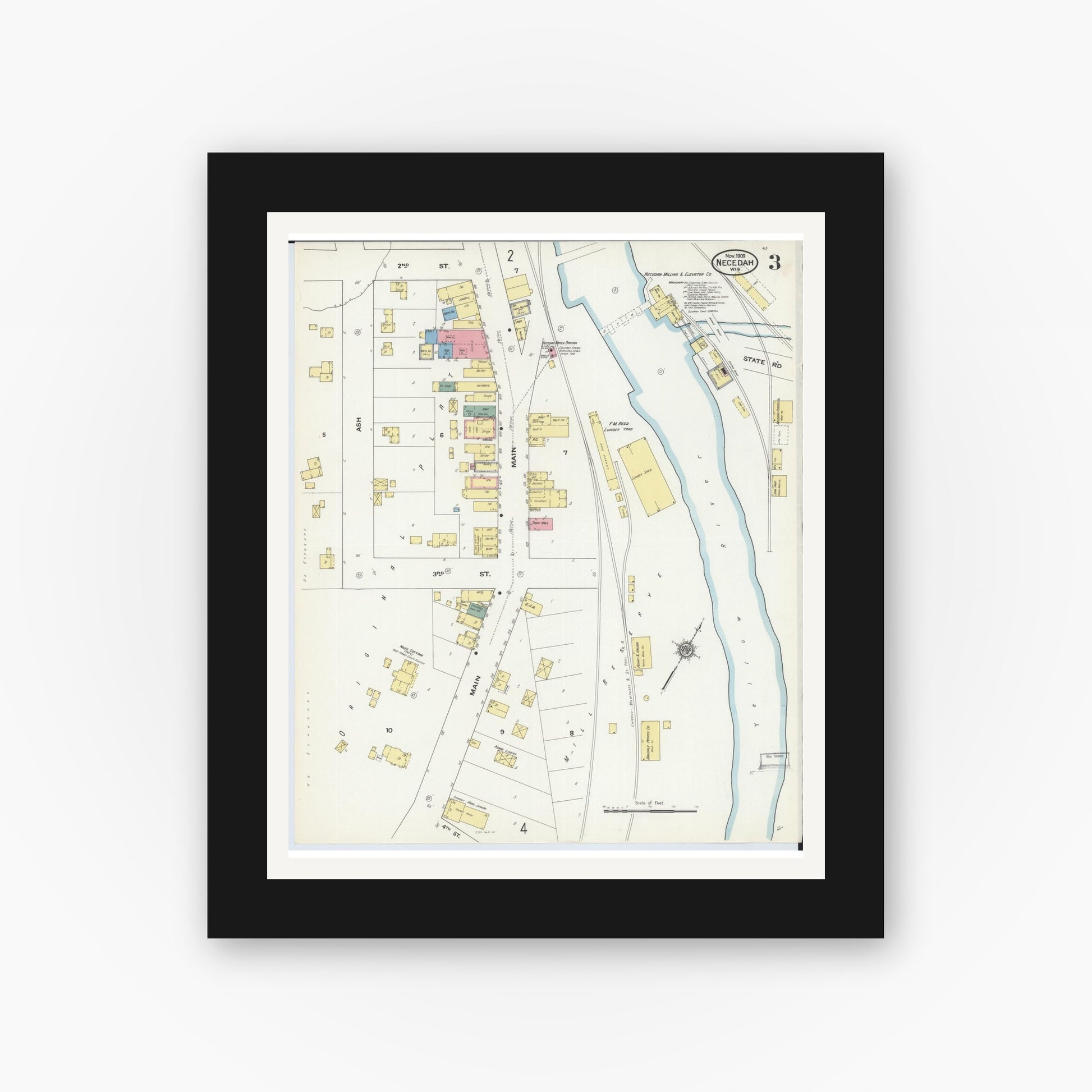 Old map wall art mockup — black gallery frame with white mat — Sanborn Fire Insurance Map from Necedah, Juneau County, Wisconsin (1909), Sheet #0003