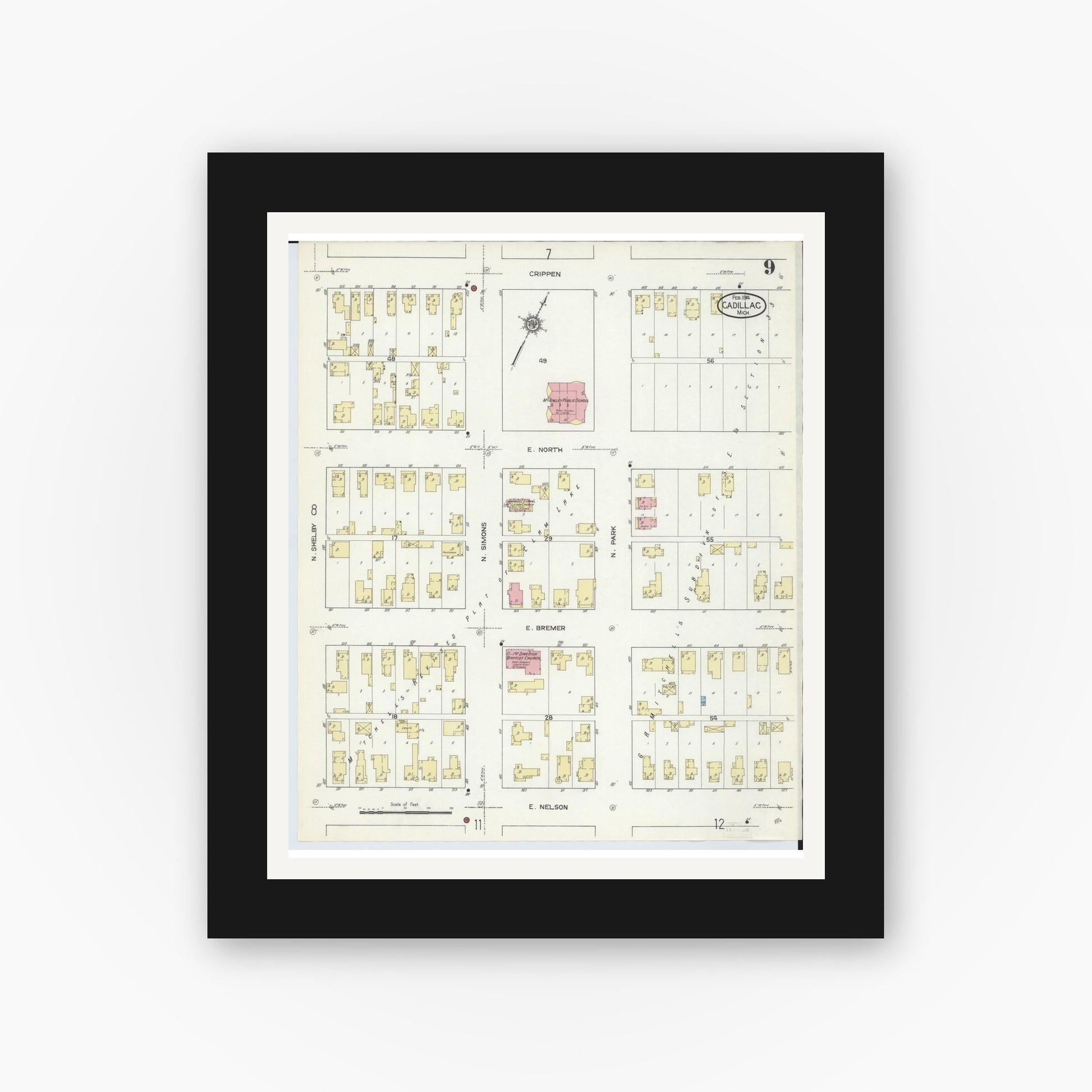 Old map wall art mockup — black gallery frame with white mat — Sanborn Fire Insurance Map from Cadillac, Wexford County, Michigan (1914), Sheet #0009