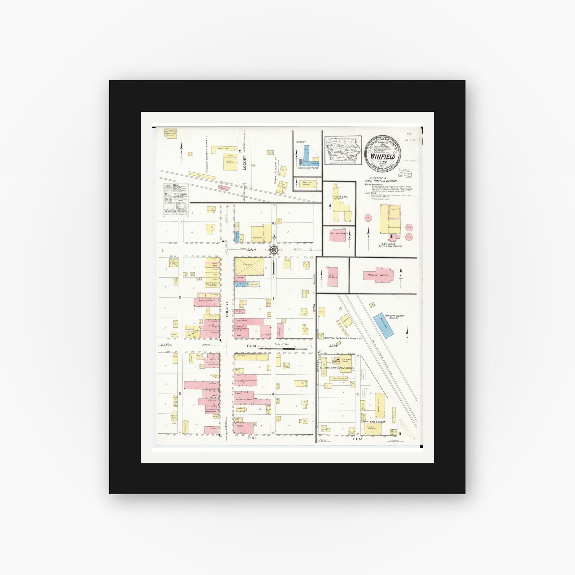 Old map wall art mockup — black gallery frame with white mat — Sanborn Fire Insurance Map from Winfield, Henry County, Iowa (1917), Sheet #0001