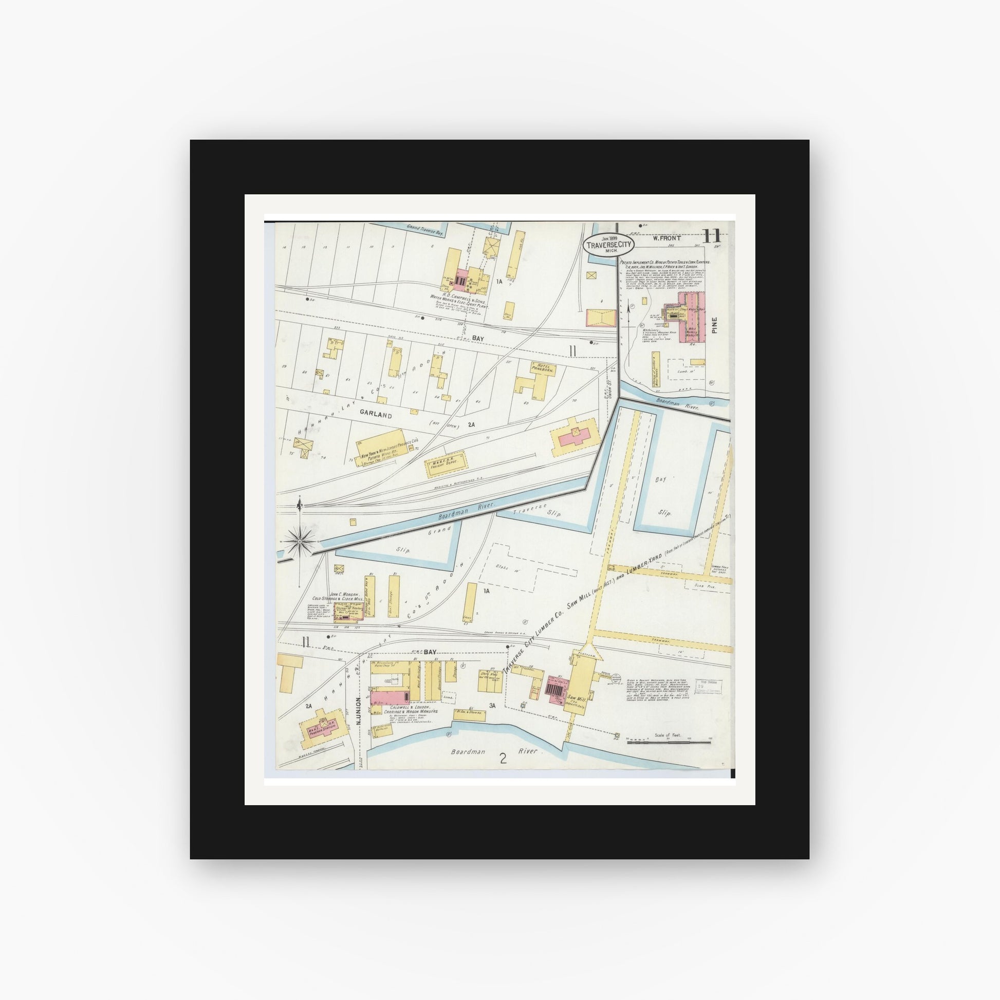 Old map wall art mockup — black gallery frame with white mat — Sanborn Fire Insurance Map from Traverse City, Grand Traverse County, Michigan (1899), Sheet #0011