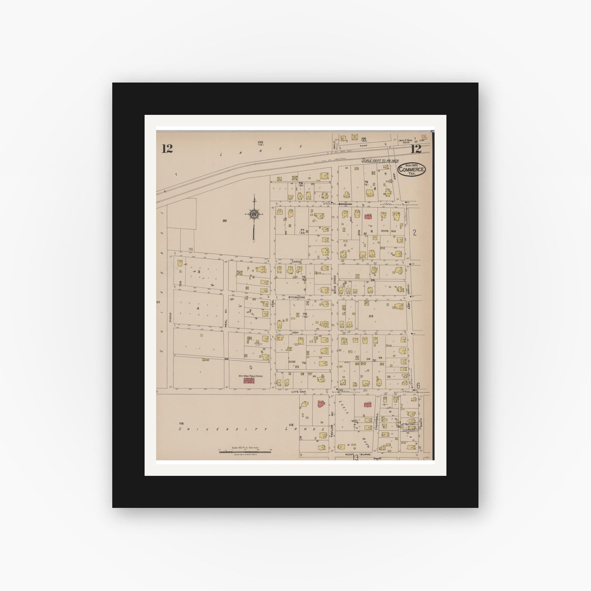 Old map wall art mockup — black gallery frame with white mat — Sanborn Fire Insurance Map from Commerce, Hunt County, Texas (1922), Sheet #0012