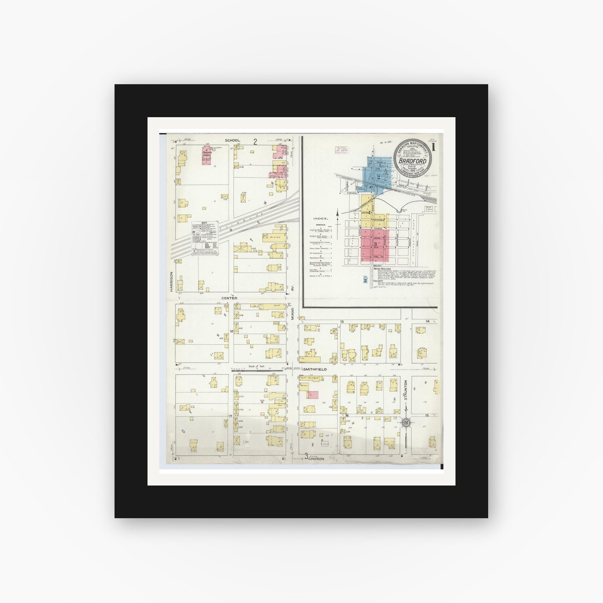 Old map wall art mockup — black gallery frame with white mat — Sanborn Fire Insurance Map from Bradford, Darke and Miami Counties, Ohio (1910), Sheet #0001