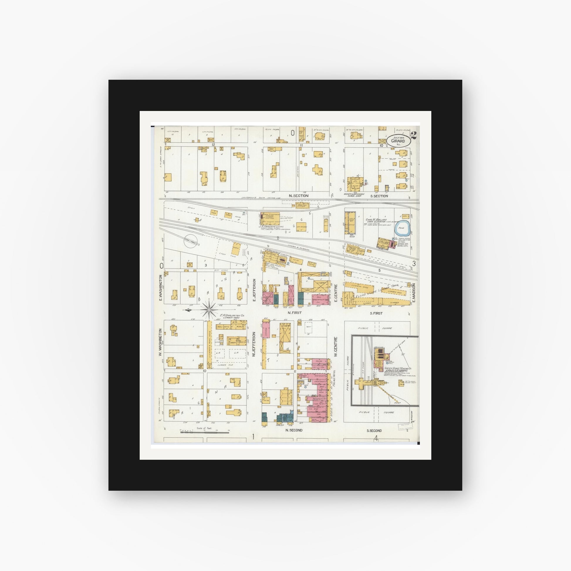 Old map wall art mockup — black gallery frame with white mat — Sanborn Fire Insurance Map from Girard, Macoupin County, Illinois (1906), Sheet #0002