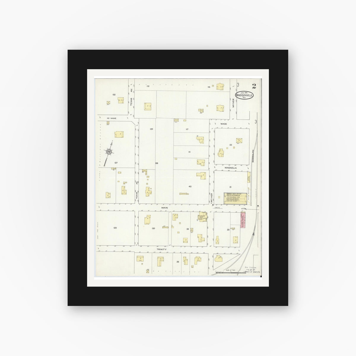 Old map wall art mockup — black gallery frame with white mat — Sanborn Fire Insurance Map from Madisonville, Madison County, Texas (1914), Sheet #0002