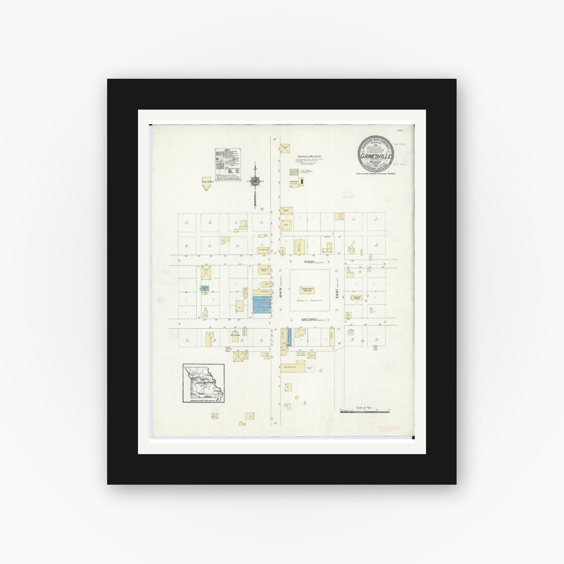 Old map wall art mockup — black gallery frame with white mat — Sanborn Fire Insurance Map from Gainesville, Ozark County, Missouri (1912), Sheet #0001