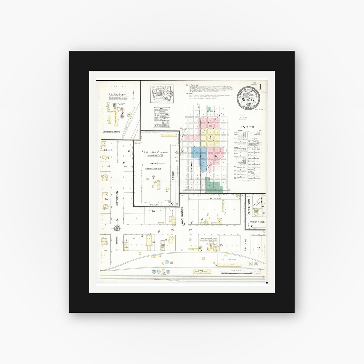 Old map wall art mockup — black gallery frame with white mat — Sanborn Fire Insurance Map from De Witt, Clinton County, Iowa (1914), Sheet #0001