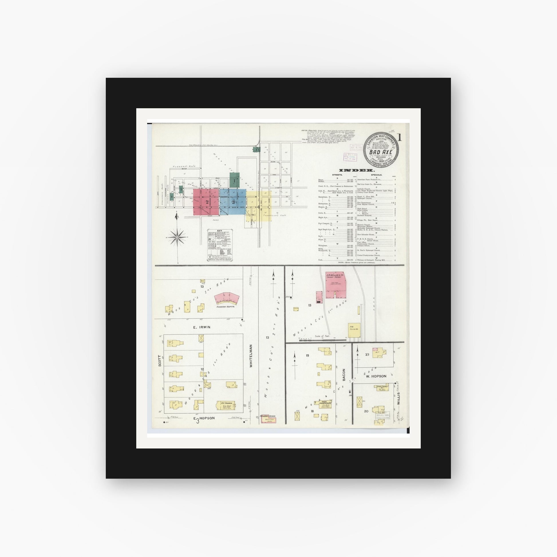 Old map wall art mockup — black gallery frame with white mat — Sanborn Fire Insurance Map from Bad Axe, Huron County, Michigan (1909), Sheet #0001