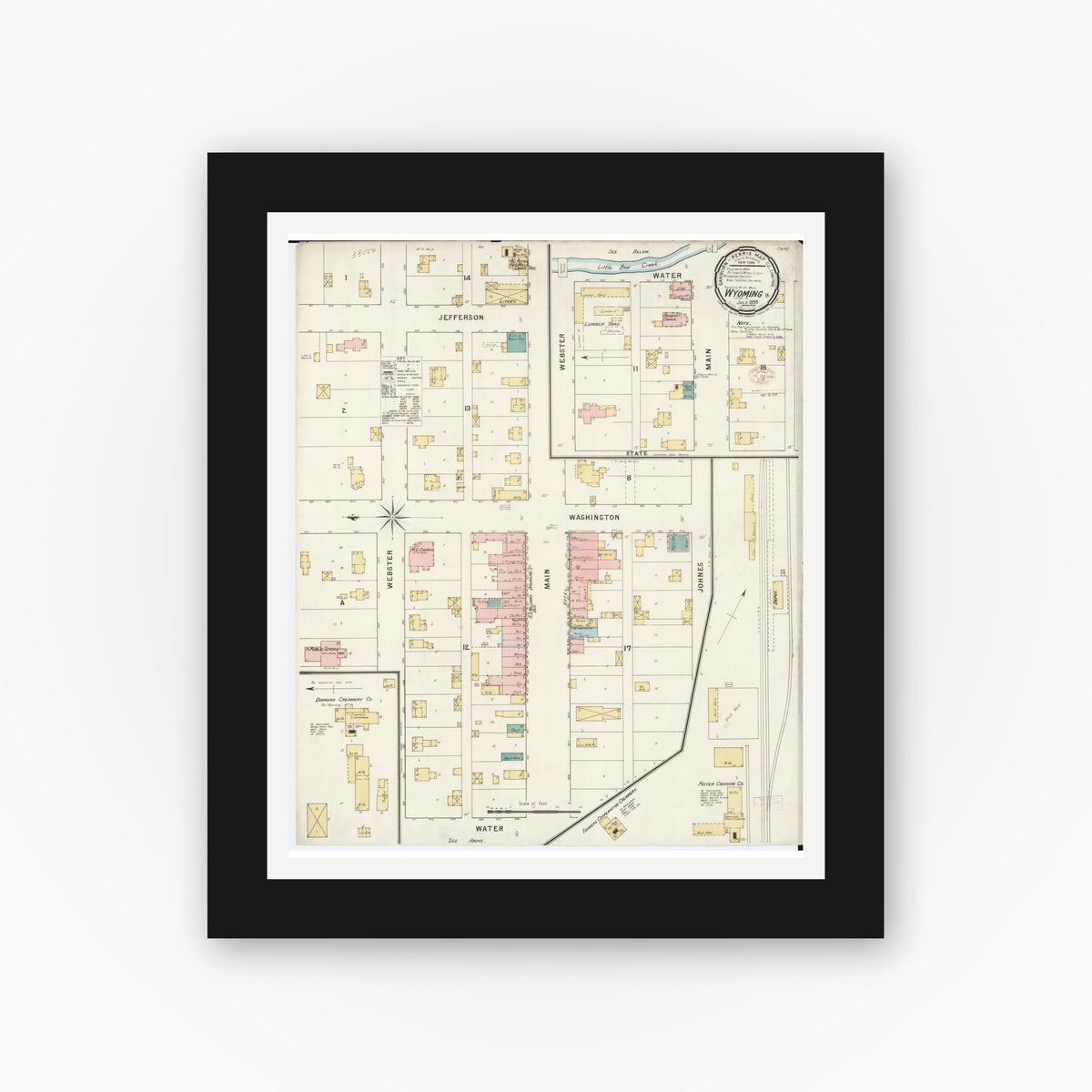 Old map wall art mockup — black gallery frame with white mat — Sanborn Fire Insurance Map from Wyoming, Jones County, Iowa (1895), Sheet #0001