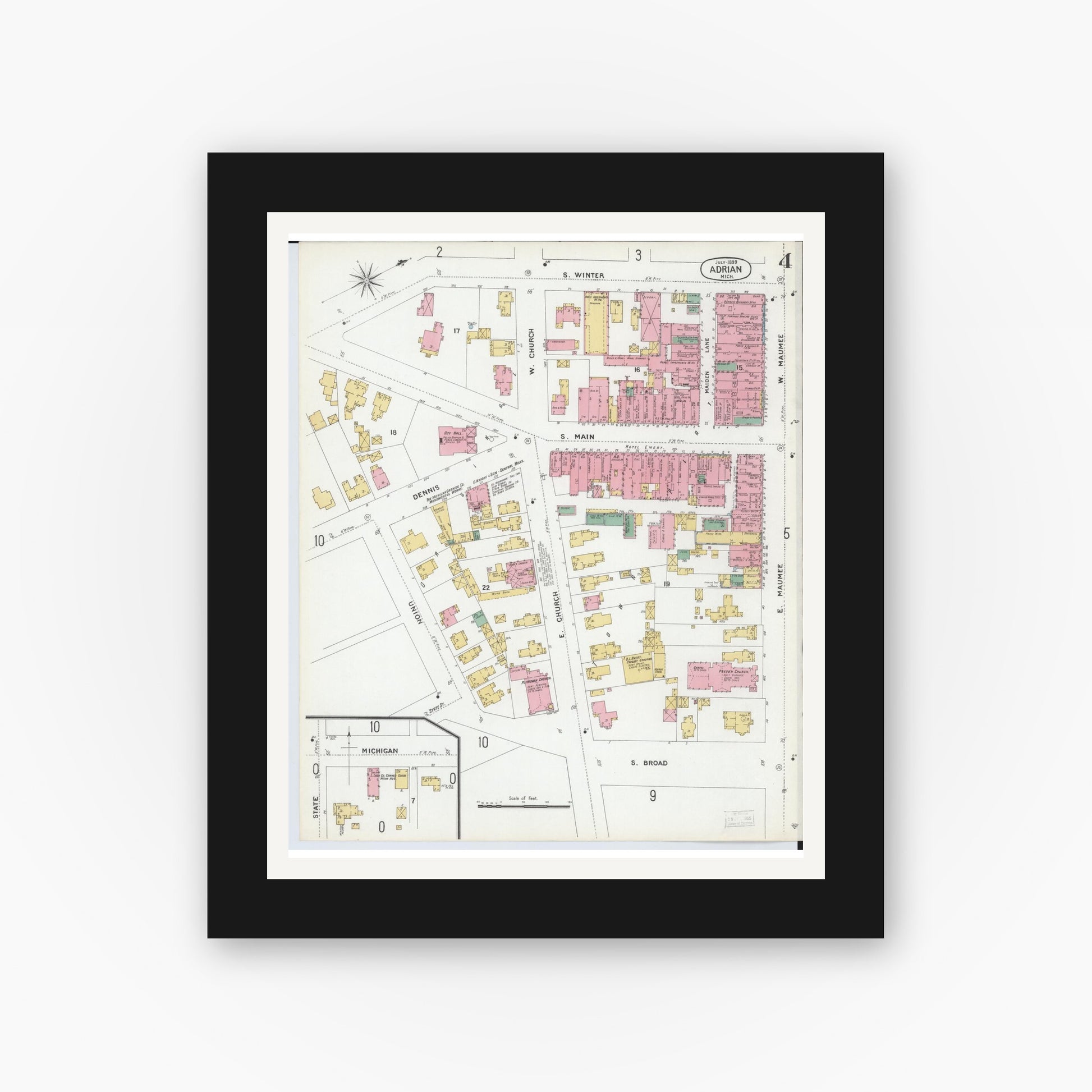 Old map wall art mockup — black gallery frame with white mat — Sanborn Fire Insurance Map from Adrian, Lenawee County, Michigan (1899), Sheet #0004