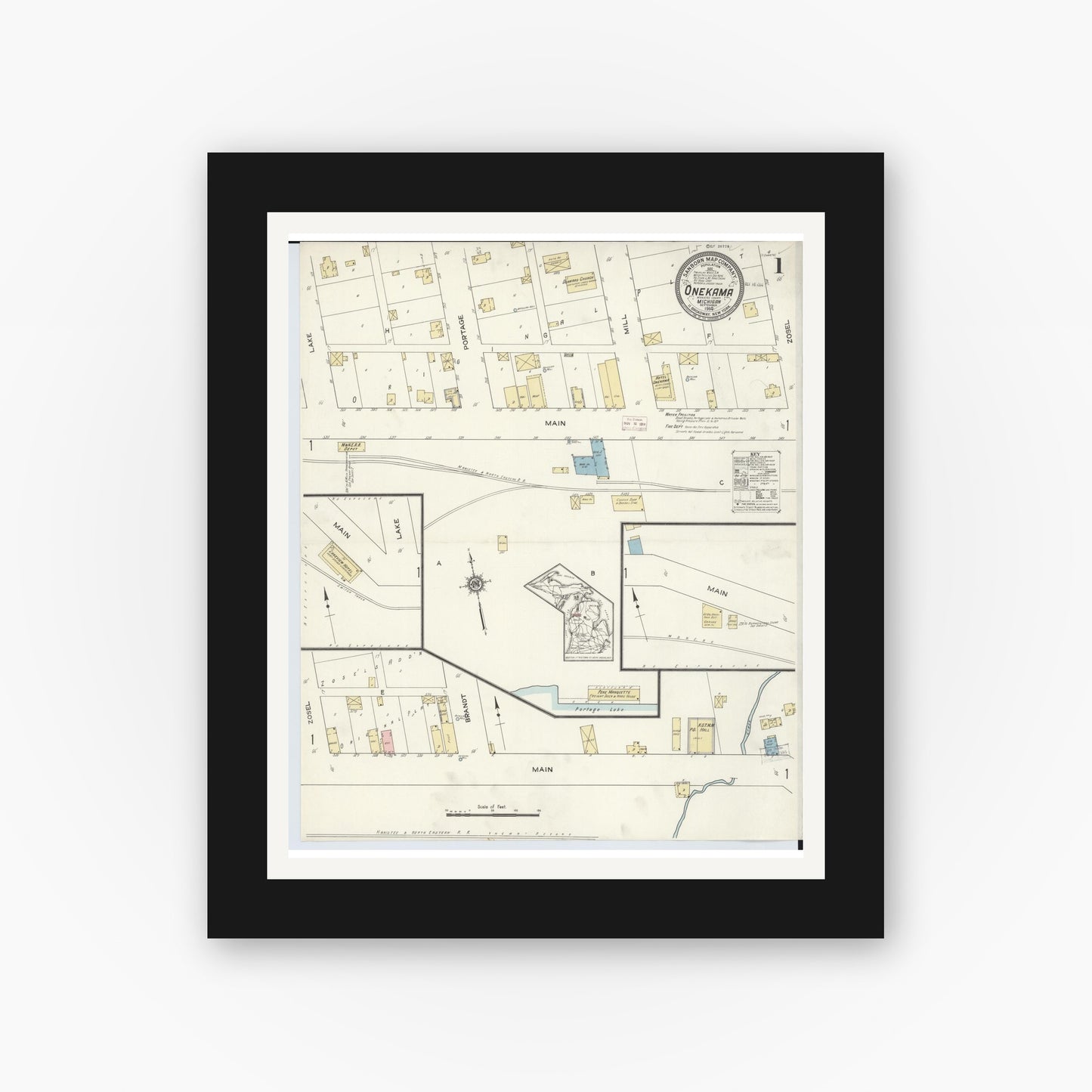 Old map wall art mockup — black gallery frame with white mat — Sanborn Fire Insurance Map from Onekama, Manistee County, Michigan (1914) - Complete Map Set