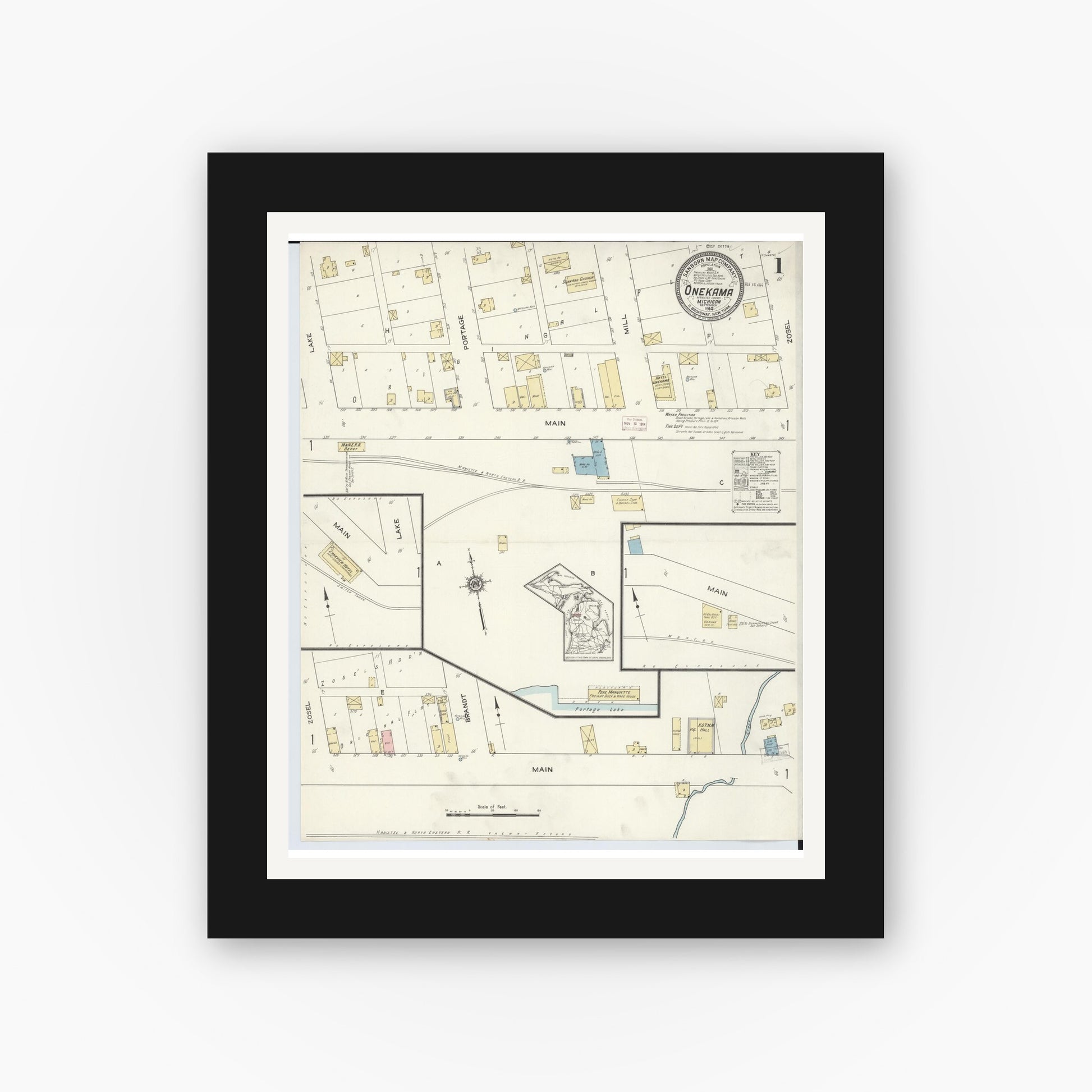 Old map wall art mockup — black gallery frame with white mat — Sanborn Fire Insurance Map from Onekama, Manistee County, Michigan (1914) - Complete Map Set
