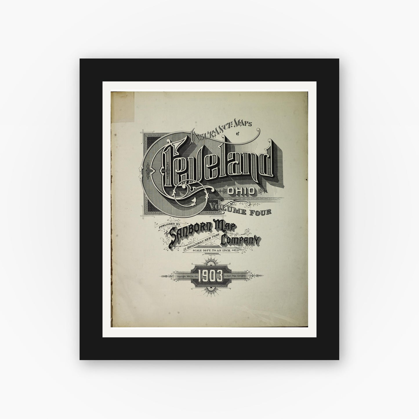 Old map wall art mockup — black gallery frame with white mat — Sanborn Fire Insurance Map from Cleveland, Cuyahoga County, Ohio (1903), Sheet #0001