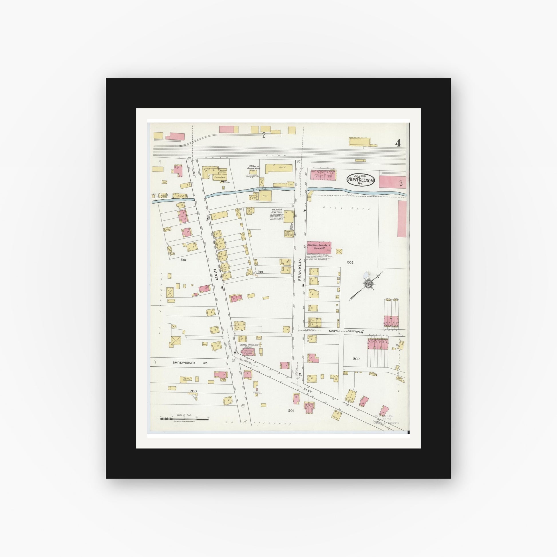 Old map wall art mockup — black gallery frame with white mat — Sanborn Fire Insurance Map from New Freedom, York County, Pennsylvania (1919), Sheet #0004
