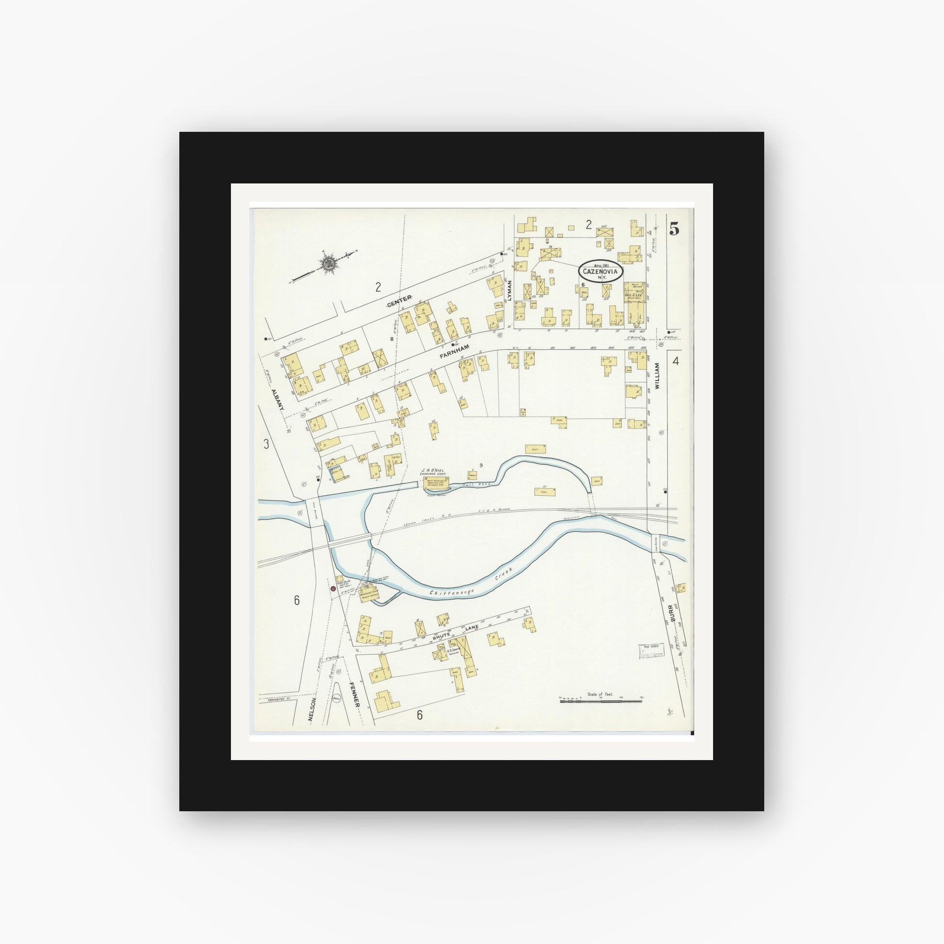Old map wall art mockup — black gallery frame with white mat — Sanborn Fire Insurance Map from Cazenovia, Madison County, New York (1911), Sheet #0005