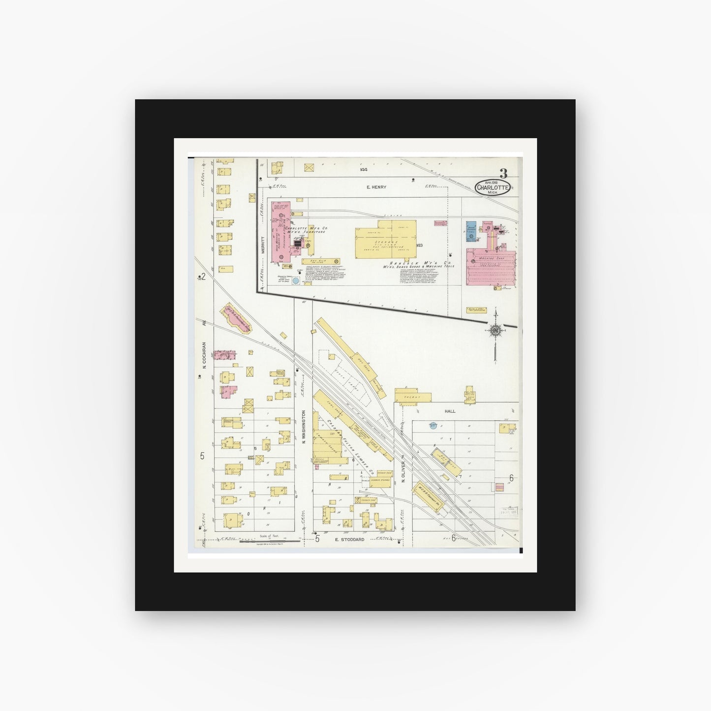Old map wall art mockup — black gallery frame with white mat — Sanborn Fire Insurance Map from Charlotte, Eaton County, Michigan (1918), Sheet #0003