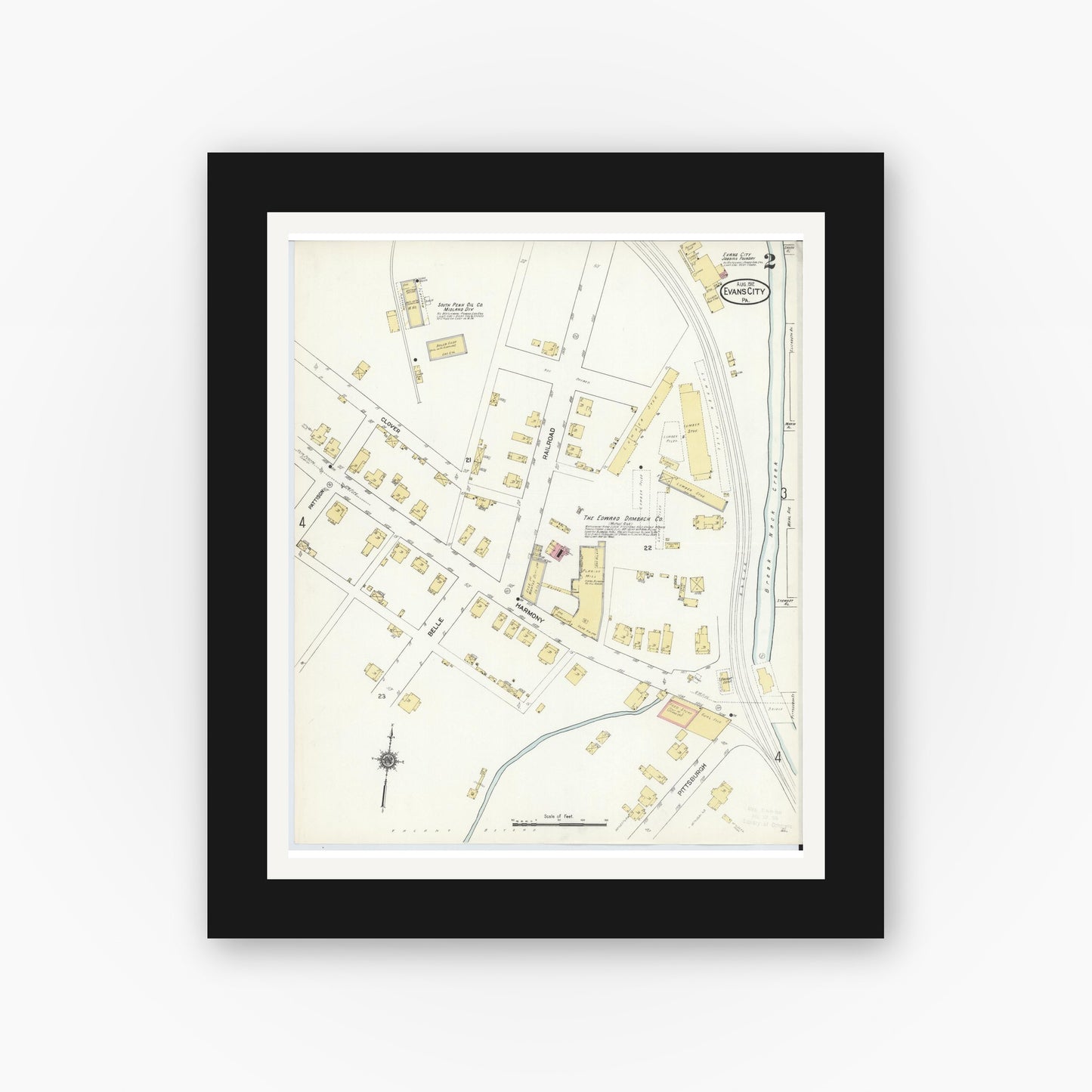 Old map wall art mockup — black gallery frame with white mat — Sanborn Fire Insurance Map from Evans City, Butler County, Pennsylvania (1912), Sheet #0002
