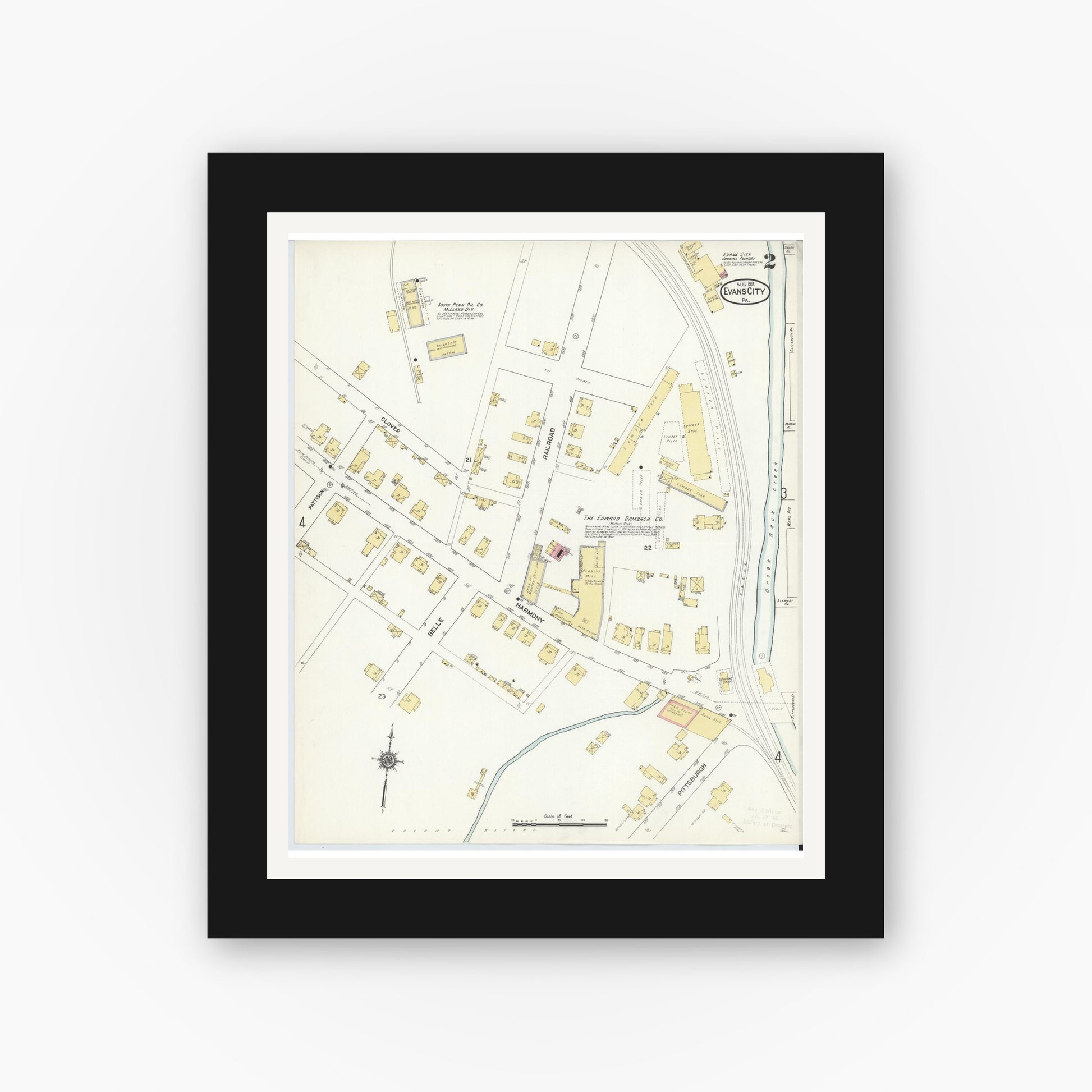 Old map wall art mockup — black gallery frame with white mat — Sanborn Fire Insurance Map from Evans City, Butler County, Pennsylvania (1912), Sheet #0002