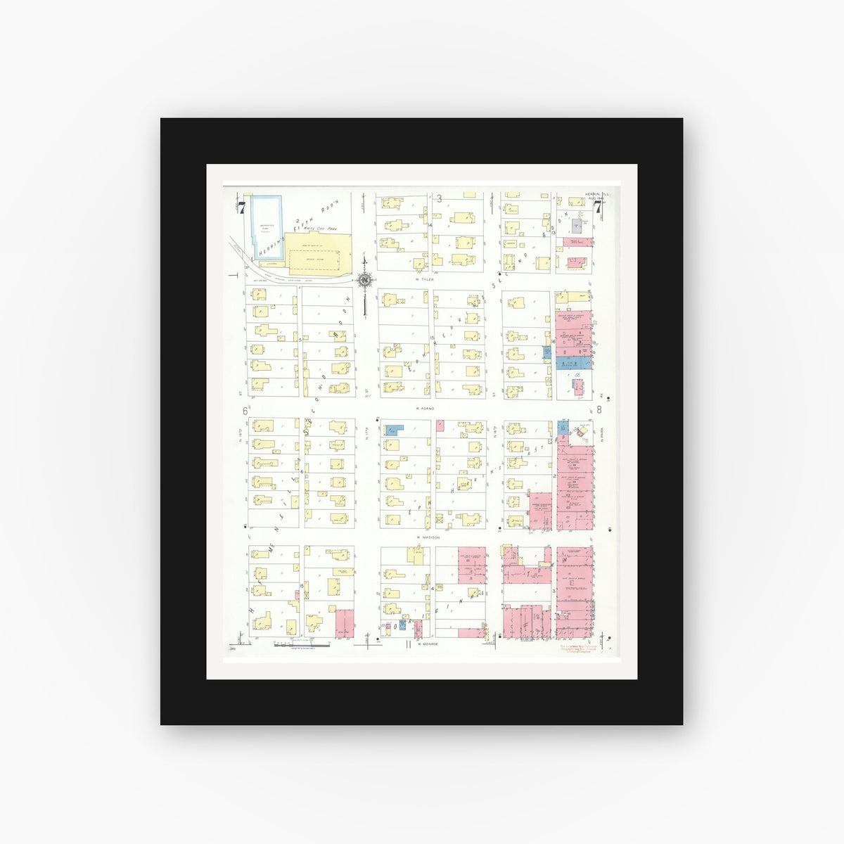 Old map wall art mockup — black gallery frame with white mat — Sanborn Fire Insurance Map from Herrin, Williamson County, Illinois (1941), Sheet #0007