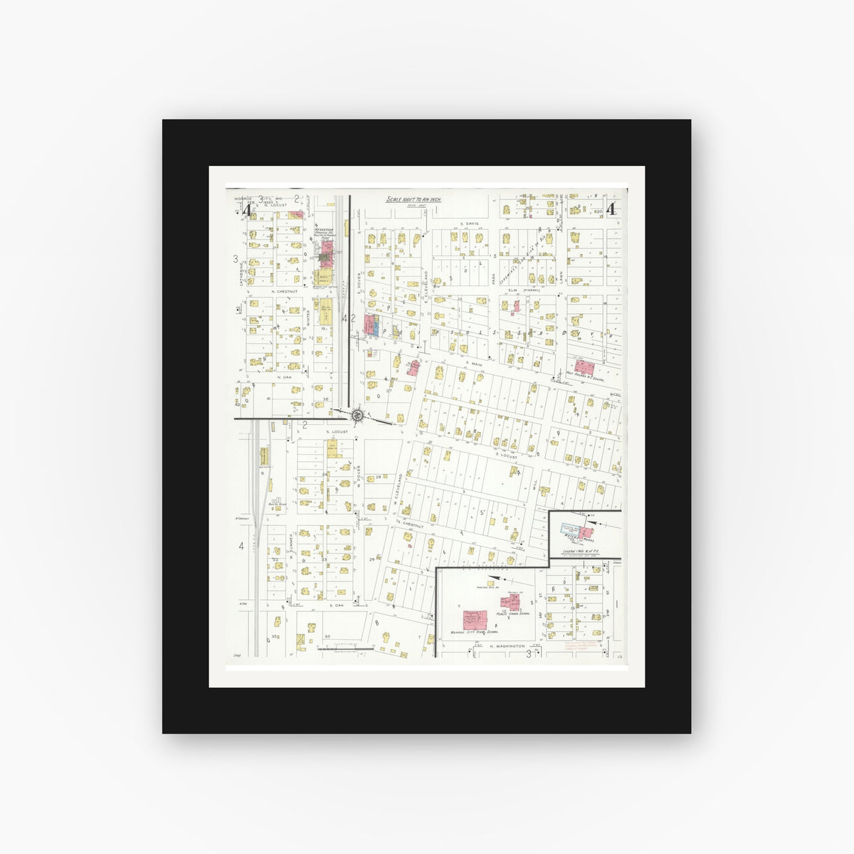 Old map wall art mockup — black gallery frame with white mat — Sanborn Fire Insurance Map from Monroe City, Monroe County, Missouri (1933), Sheet #0004