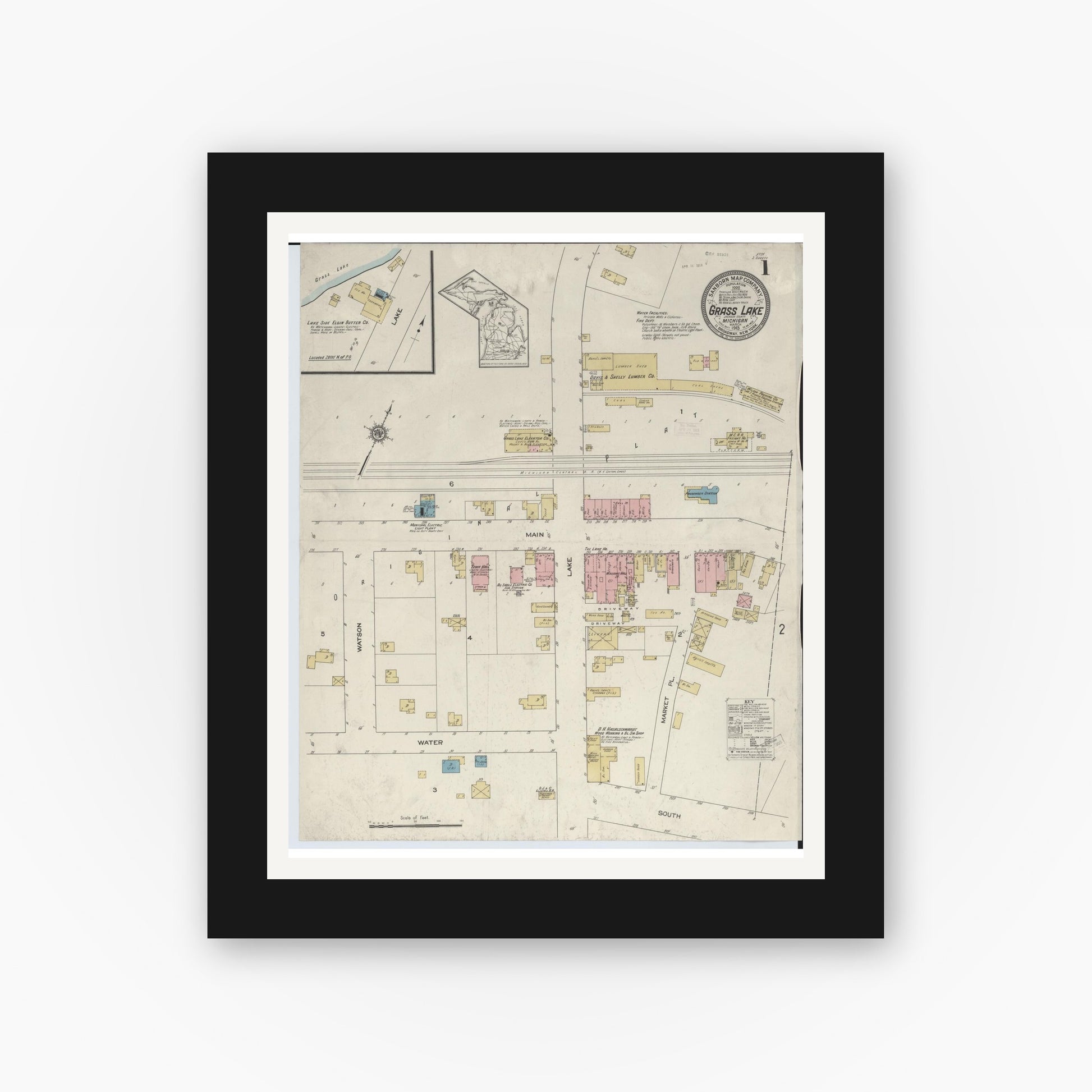 Old map wall art mockup — black gallery frame with white mat — Sanborn Fire Insurance Map from Grass Lake, Jackson County, Michigan (1913) - Complete Map Set