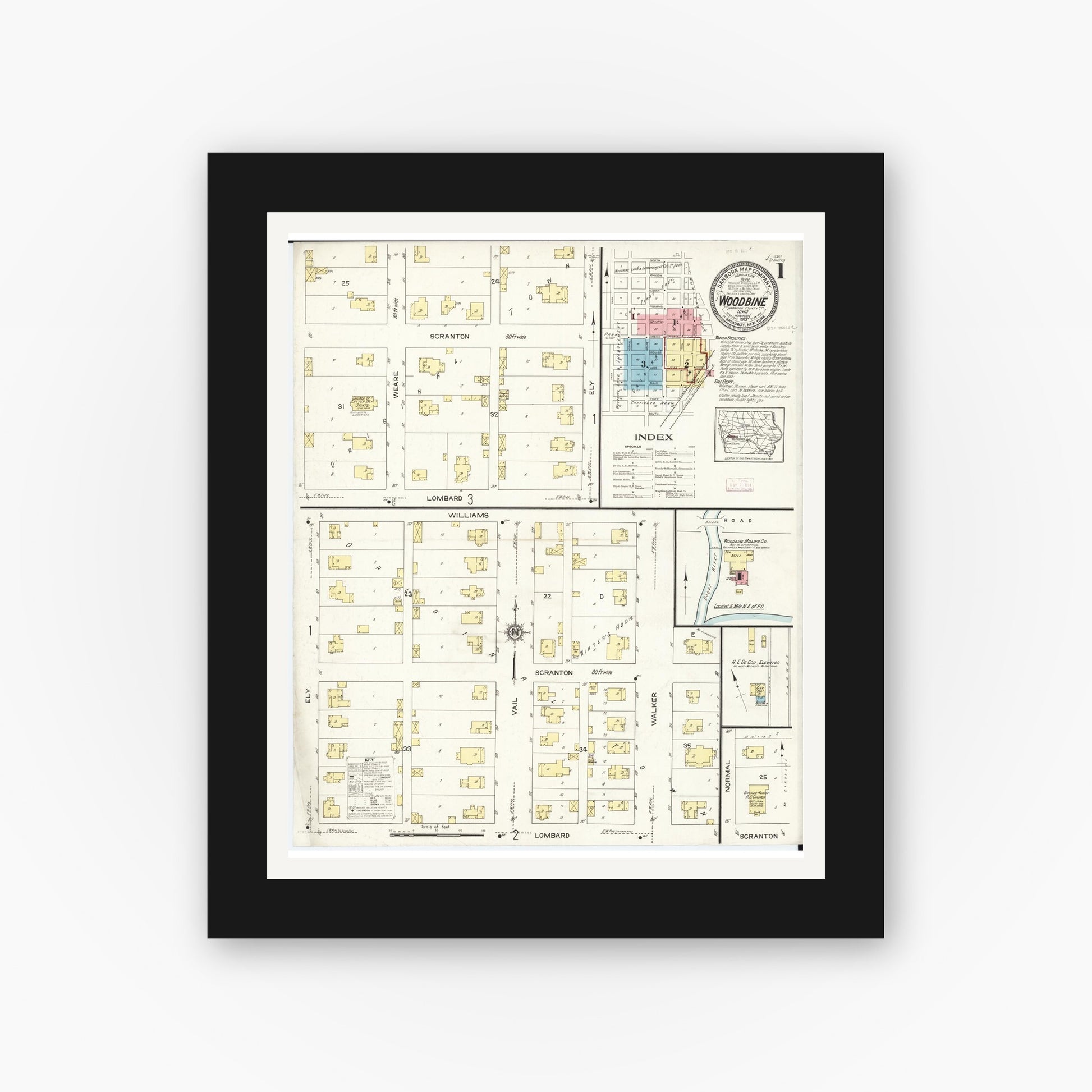 Old map wall art mockup — black gallery frame with white mat — Sanborn Fire Insurance Map from Woodbine, Harrison County, Iowa (1913), Sheet #0001