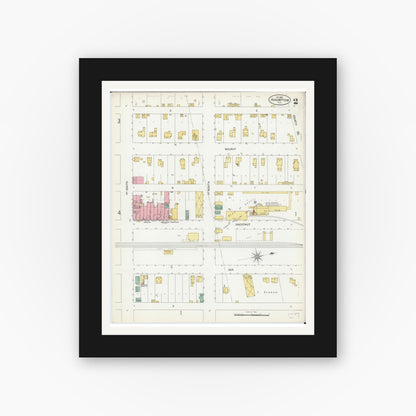 Old map wall art mockup — black gallery frame with white mat — Sanborn Fire Insurance Map from Assumption, Christian County, Illinois (1899), Sheet #0002