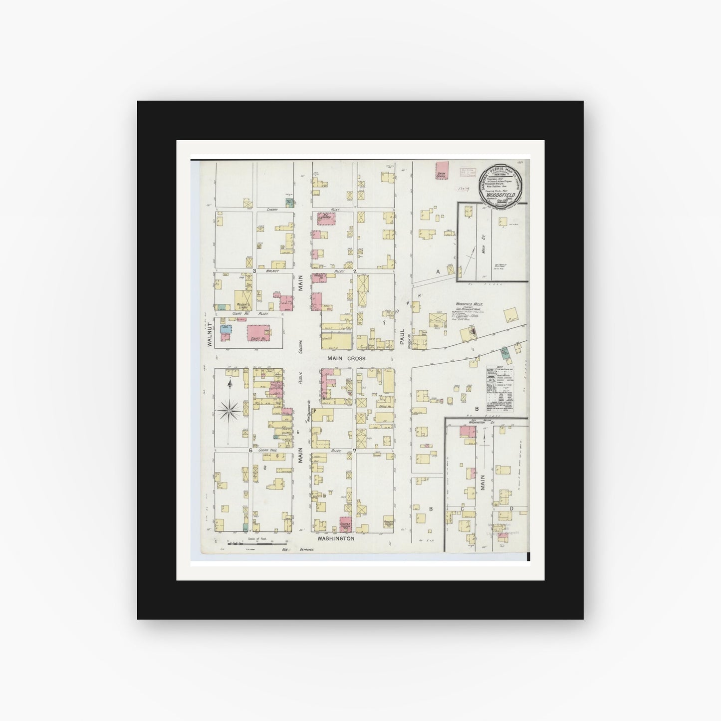 Old map wall art mockup — black gallery frame with white mat — Sanborn Fire Insurance Map from Woodsfield, Monroe County, Ohio (1893), Sheet #0001