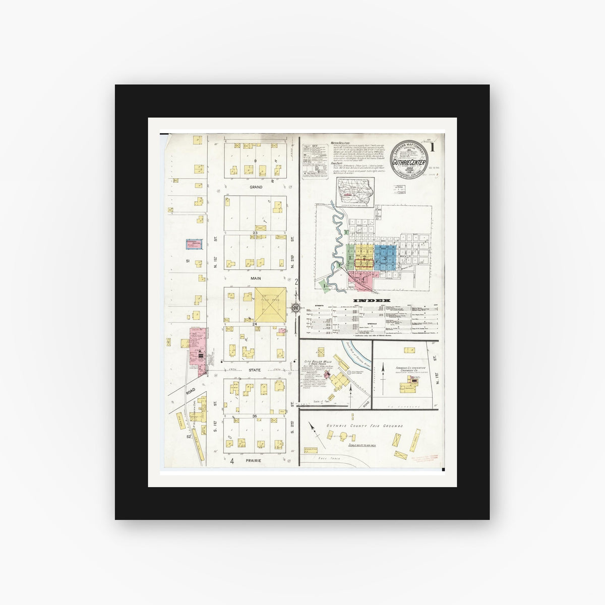 Old map wall art mockup — black gallery frame with white mat — Sanborn Fire Insurance Map from Guthrie Center, Guthrie County, Iowa (1916) â€” Complete Set