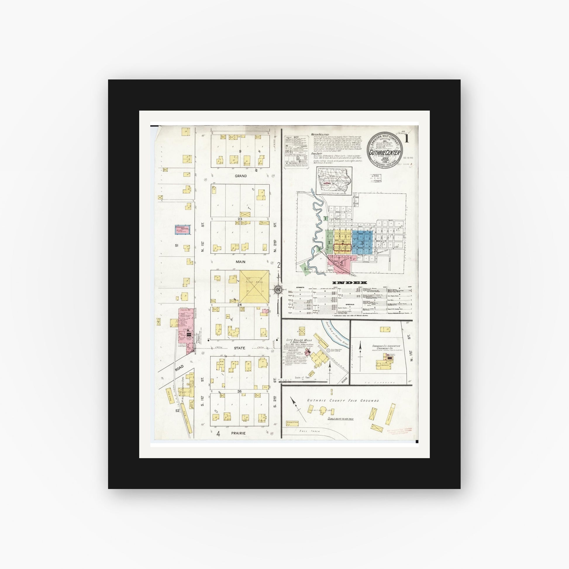 Old map wall art mockup — black gallery frame with white mat — Sanborn Fire Insurance Map from Guthrie Center, Guthrie County, Iowa (1916) â€” Complete Set