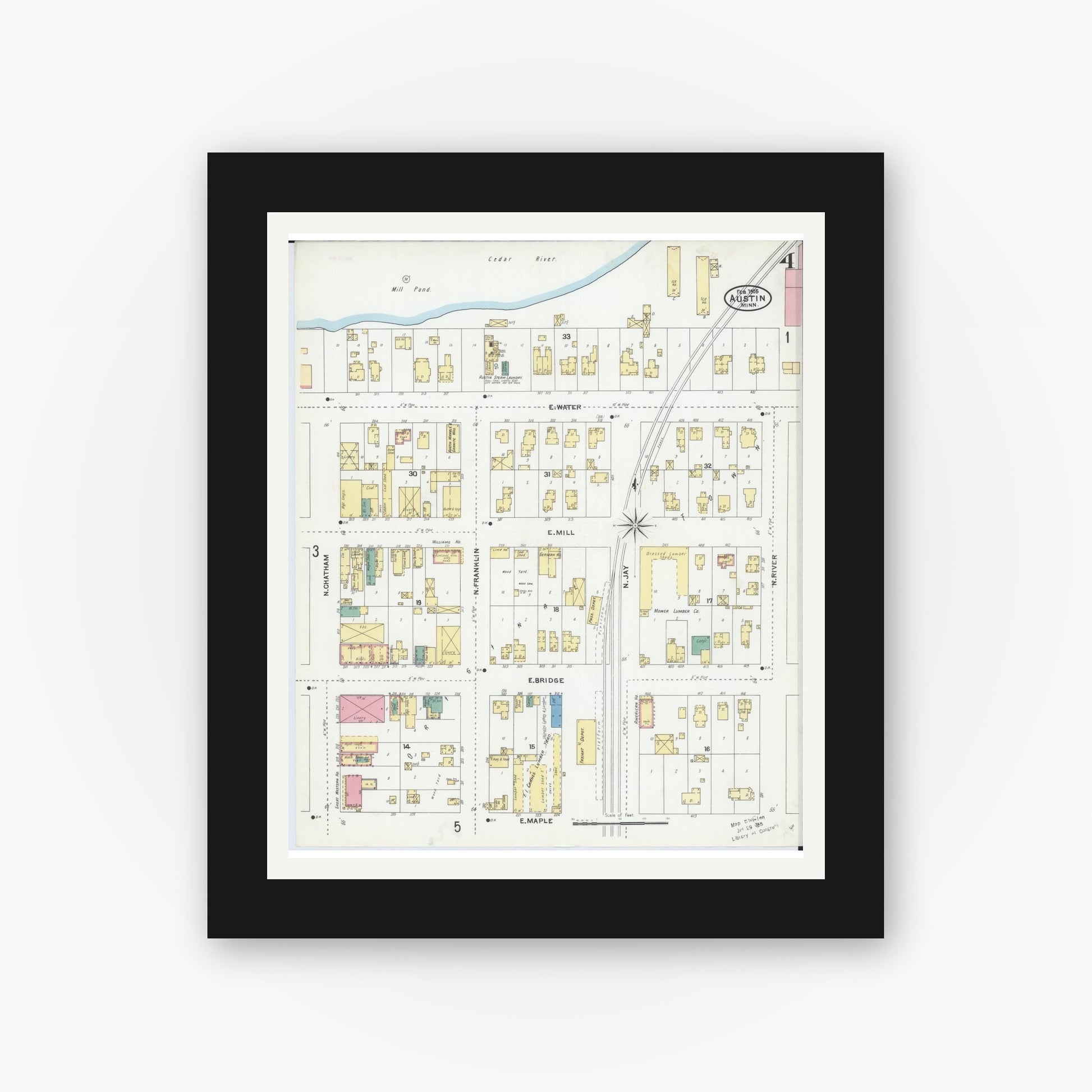 Old map wall art mockup — black gallery frame with white mat — Sanborn Fire Insurance Map from Austin, Mower County, Minnesota (1905), Sheet #0004