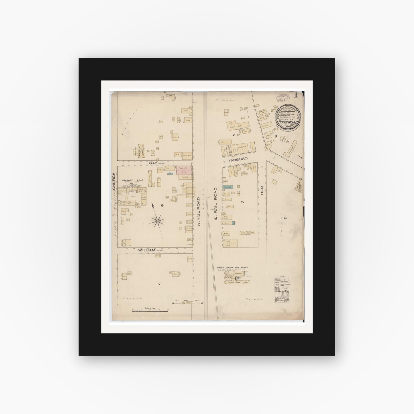 Old map wall art mockup — black gallery frame with white mat — Sanborn Fire Insurance Map from Rocky Mount, Edgecombe And Nash Counties, North Carolina (1885) - Complete Map Set