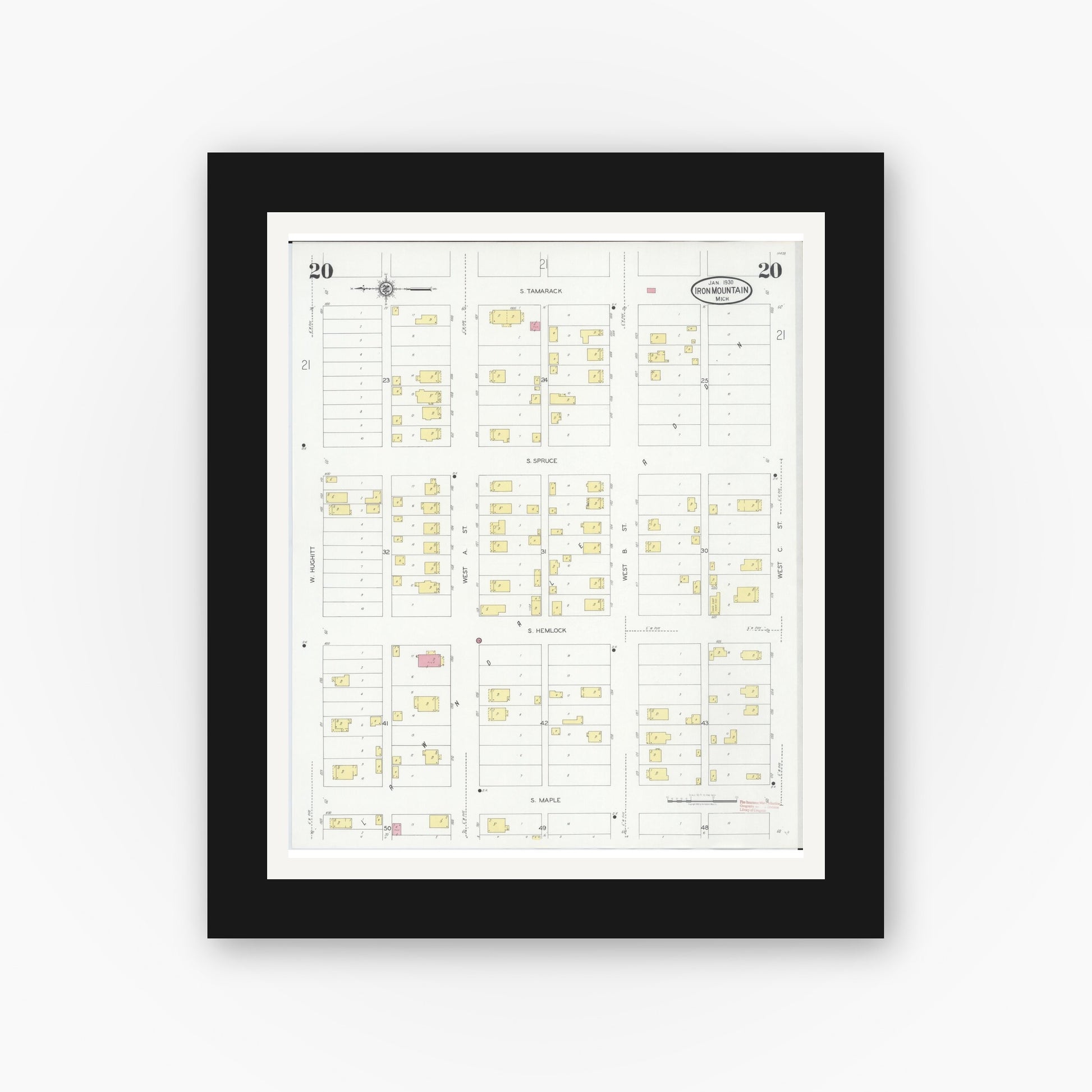 Old map wall art mockup — black gallery frame with white mat — Sanborn Fire Insurance Map from Iron Mountain, Dickinson County, Michigan (1930), Sheet #0020