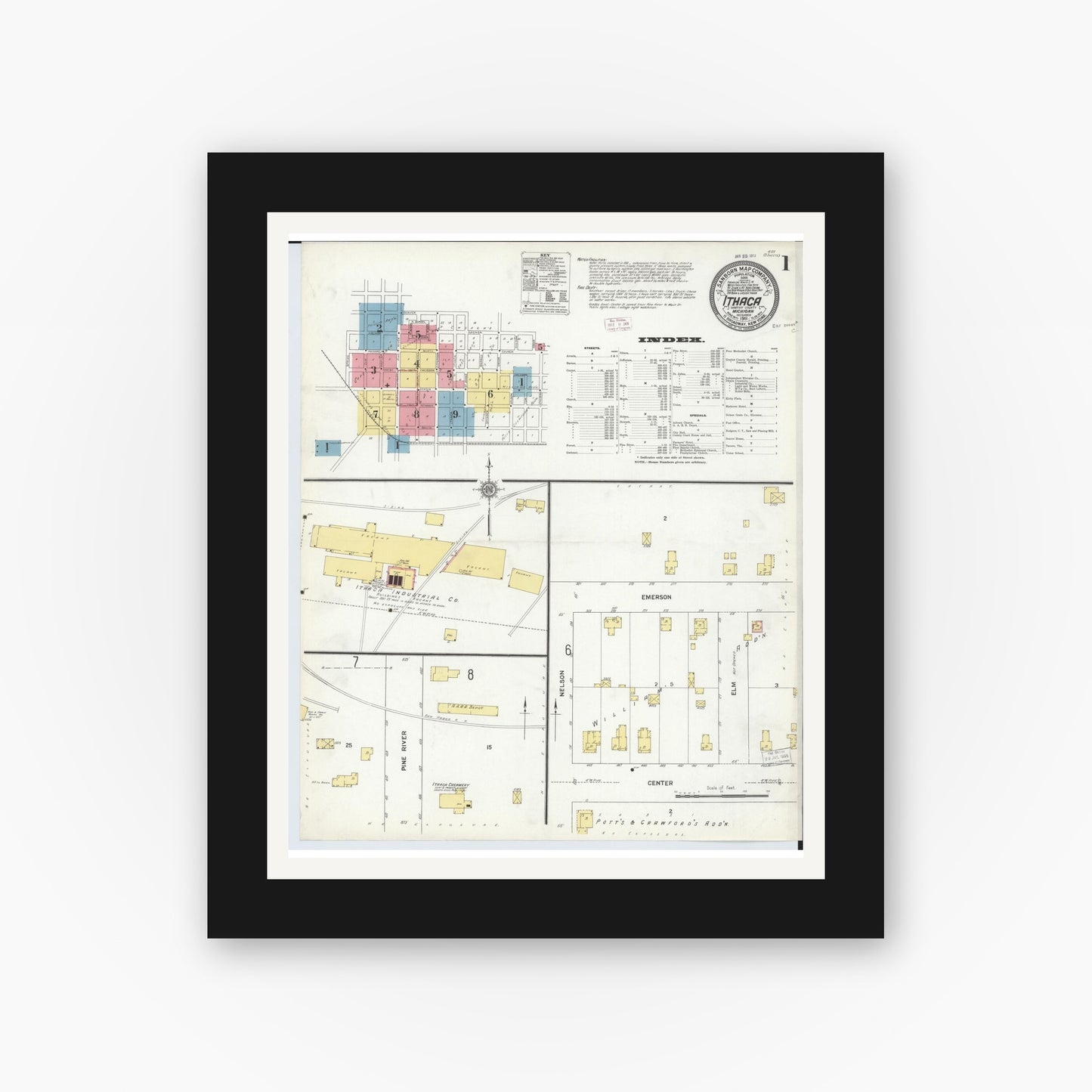 Old map wall art mockup — black gallery frame with white mat — Sanborn Fire Insurance Map from Ithaca, Gratiot County, Michigan (1911), Sheet #0001
